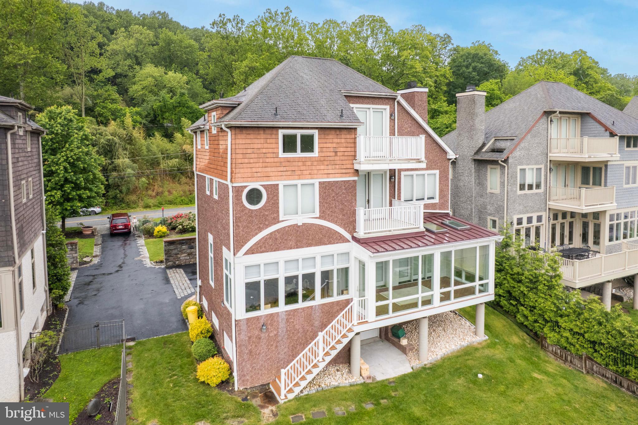 Riverfront Elegance in Gladwyne
Welcome to your private retreat on the river in sought-after Gladwyne. This exceptional 4-bedroom, 4.5-bath home offers breathtaking river views from nearly every room, blending serene waterfront living with timeless elegance and modern comfort.
Enjoy seamless indoor-outdoor living with direct river access from your private dock—perfect for boating, kayaking, or simply unwinding by the water. A dedicated boat room offers convenience and storage for all your riverfront adventures.
Inside, you'll find 10-foot ceilings and gleaming hardwood floors throughout the main level. The gourmet kitchen is a chef’s dream, featuring floor-to-ceiling cabinetry, granite countertops, a large island, and gently used stainless steel appliances that feel like new.
Each bedroom is generously sized, and all bathrooms are beautifully appointed. With four full bathrooms and a powder room, there’s space and privacy for everyone. The layout is ideal for both entertaining and everyday living.
Located on a quiet road in a coveted school district, this home offers peace, privacy, and prestige—just minutes from everything the Main Line has to offer.
Rarely does a riverfront property like this become available in Gladwyne. Don’t miss your chance to live where nature, luxury, and convenience meet.