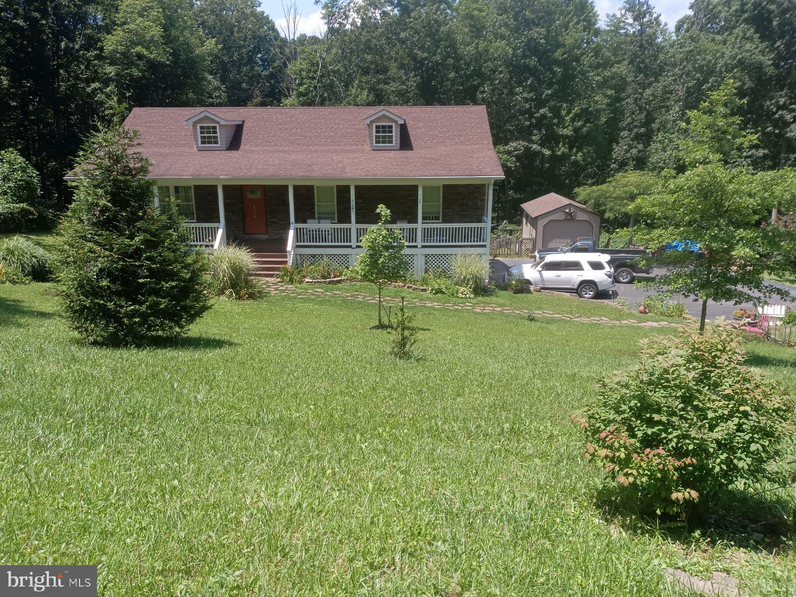 Spacious Stone and Vinyl Rancher with 2764 finished square feet which includes 3 bedrooms and 3 full bathrooms located in a beautiful setting on 6.05 acres with mature trees (2 parcels included in sale and both Perked). Kitchen features Granite counters, tile backsplash, double oven, ceramic tile floor, lighted pantry with wooden shelves, some new appliances. Bamboo floor and chair rail in open area (LR), hall, Primary Bedroom and Stairs. Gorgeous Primary bedroom with tray ceiling and chandelier, Dual closets. Primary Bathroom with two sink cabinets, ceramic floor and jetted tub. Second and third bathrooms have Ceramic tile floors. Basement boasts Woodstove with brick Hearth and full bathroom. Full length covered front porch and newly custom built peaked roof over rear door. Ceiling fans in Living room, Primary Bedroom and Basement Family Room. LVP floors throughout Basement. Water conditioner system, Radon System, 40 year Architectural Shingles, Leafguard Gutter System, Rear yard fence, 12 x 24 building with concrete ramp, 15' above ground pool (not opened this year due to moving but works great), Wooded Acreage with Hardwoods, Deck off Dining Area, Oversized 2 Car Garage. Livestock, goats, chickens allowed. Most of Fulton Rd is paved but the areas that are gravel will be graded and gravel installed in the near future and sellers will cover share of their cost. See Features List for details! Only 3 miles from Berkeley County line on Rt 9 & 11 miles to I-70. Don’t miss this one!
