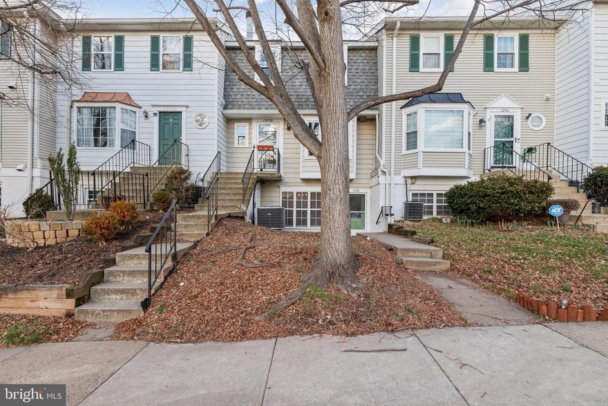 OFFER DEADLINE  - 9PM on 2/18 - Welcome to this bright and spacious 1-level condo in Winding Brook! This charming unit features expansive, light-filled living room w/ cozy wood burning fireplace, dining area, and lovely kitchen w/ updated counters, stainless steel appliances, and white cabinetry. The two roomy, sunlit bedrooms offer plenty of space to relax, as well as large closets. Warm wood laminate flooring runs through the main areas, and fresh paint throughout! Laundry worries are a thing of the past with a full size washer and dryer in unit! This special unit boasts a spacious FENCED BACKYARD w/ endless possibilities! Winding Brook offers fantastic amenities such as outdoor pool, club house, tennis court, walking trails, and dog park. Two parking passes plus ample visitor parking. Amazing location just minutes from shopping and dining (Greenbriar Town Center, Sully Place Shopping Center, Costco, Wegmans, and more), and easy commute to Routes 50, 28, 66, Fairfax County Parkway, and Dulles Airport!
