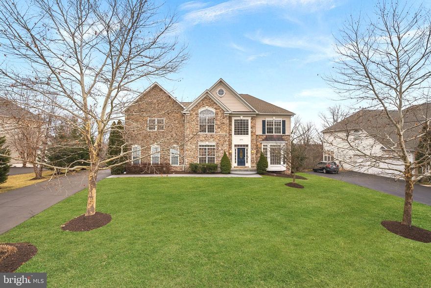 Spectacular PRECIOUS home in Estates of Forest Ridge w/Briar Woods HS & Eagle Ridge MS Pyramid; ONE not to miss! Stately stone front elevation, sited on 0.56 acreage w/unobstructed views at front, peaceful wood views at rear, & desired EAST-WEST setting; offering breathtaking dynamic lighting from warm bright morning sunrises & golden glow afternoon sunsets. This executive stands tall w/its WALK-OUT feature providing far-reaching views. Long driveway to SIDE LOAD garage & hardscape stairs from driveway to multiple OUTDOOR spaces at rear; a convenience aspect. Meticulously thoughtfully crafted backyard! A 10-zone underground sprinklers for lush green lawn. Home components: 2023 Water Heater, 2014 Roof, 2013 HVAC.<br><br>This incredible home boasts 5,570 fin sq ft spanning over 3 lvls is appointed by 5 spacious bed rms & 4.5 renovated bath rms in 2024 & 2025<br><br>Step inside this gorgeous home to celebrate care & value! Experience the architectural wow factor w/2-story dramatic foyer, long windows, open front oak staircase w/new stair treads, posts, railings, & spindles accomplished in 2025, illuminated rear staircase adorned w/picture window, soaring 2-story family w/striking floor to ceiling stone fireplace, 10 ft ceilings at main lvl maintains ventilation, & extensive hallways makes the home breezy & airy.<br><br>The entire home welcomes w/wide plank marble-like LVP floors, adding polished sophisticated look; upper LVP were RECENTLY installed to match the current, emphasizing unity. A niche for your favorite sculpture, enormous dining w/chair railing_shadow boxes & living w/bay window to either side of grand foyer, double doors to library w/bookshelves, a half bath situated next to library allowing easy conversion for main lvl bed rm, butler's pantry w/2025 cabinets, counters, backsplash complete the home's formal touch. Triple entry to casual part, seamlessly thru broad openings enhances interior feel & easy to maneuver.<br><br>Gut renovation & redesigned kitchen in 2025 delivers a cohesive layout! Expanded kitchen space w/new interior, reinforced floors w/high grade plywood, insulation at walls & floors, gourmet layout w/upscale SS appliances (except for Refrigerator-2021), vast center island w/cabinets, breakfast w/TV nook, 2-tone_ tiered cabinets to ceiling, pantry drawers, decorative hardware, quartz counters, cheerful backsplash, pendants, & oversized undermount sink. Access 380 sq ft maintenance-free humongous deck off of breakfast area thru french door. Mudroom addition in 2025 for streamline daily routine! Quartz bench, upper_lower cabinets keeps the home beautifully organized.<br><br>Fresh coat of paint to walls & trims, new LED recessed, elegant chandeliers at foyer, family & dining, & new electric wall plates at main lvl were all achieved in 2025. Home furnished w/custom blinds, plenty recessed, ceiling fans & media points at apt locations.<br><br>Second floor is a retreat to the luxurious primary suite w/tray ceiling & tile wall drop. Extraordinary owner’s bath w/heated floors & gigantic clst w/wardrobe organizer is sure to impress. 2nd walk-in clst w/pocket door is a bonus. Guest suite w/walk-in clst & renovated bath rm in 2025. Two additional bed rms w/walk-in clsts share a buddy bath w/standing shower. Remodeled laundry w/cabinets, sink, & new LG washer_dryer in 2025.<br><br>Enter the entertainer's basement thru a glass door installed in 2025 as well as stair posts, railings, & spindles. Homey rec area w/built-in wet bar & pool table, fully equipped home theater to immerse youself, 5th bed rm, & full bath w/RECENTLY installed standing shower; perfect for overnight guests. Access 700 sq ft patio off of rec area thru sliding door; extensive one w/2 distinct zones: covered area for dining table and/or cozy seating arrangement & uncovered area for sunbathing. Built-in gas grill for grilling-baking needs & firepit to enjoy marshmallows.<br><br>A classic elegant home to tour!