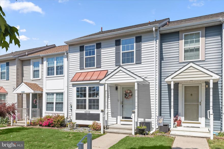 Backing to trees and offering a peaceful setting with a highly convenient location, this three-level townhome in Piney Ridge Village showcases thoughtful updates throughout, two private outdoor living spaces, and a well-designed layout that balances function and comfort.
The main level centers around an updated kitchen featuring white cabinetry enhanced with roll-out shelving and a lazy Susan, granite countertops, and recently replaced stainless steel appliances including a gas range and built-in refrigerator. A charming window seat with storage adds both character and practicality, while a pass-through window keeps the kitchen connected to the open concept living and dining areas. From the living room, step outside to a deck overlooking trees, complete with a retractable awning for added comfort. A half bath completes this level.
Upstairs, three bedrooms and a full bath provide comfortable accommodations. The primary bedroom includes a double closet, and the updated full bath features distinctive touches such as an arched ceiling detail separating the recently replaced shower from the vanity area, along with a convenient linen closet.
The lower level offers a spacious family room with a wall of closets spanning the width of the space, providing exceptional storage. A sliding glass door leads to a lower deck and a sizable backyard, one of the few in the community with direct walkout access and a wooded backdrop. This level also includes a full bath and a utility room with laundry and a gas dryer.
Additional highlights include beautiful landscaping, two reserved parking spaces with ample visitor parking, and a Ring alarm system with sensors on doors, windows, and smoke detectors. A radon mitigation system is already installed for added peace of mind. Since 2020, updates include a whole house water filter, shower, kitchen appliances, water heater, and washer and dryer.
This home benefits from easy access to everyday essentials. Grocery stores, shopping, and local restaurants are just minutes away, along with gyms and recreation facilities supporting a variety of fitness routines. Nearby schools serve the area, and parks, trails, and community spaces enhance the outdoor lifestyle. The community also maintains common areas, handles snow removal, and features a playground, rounding out a setting that balances convenience with a strong sense of community.
