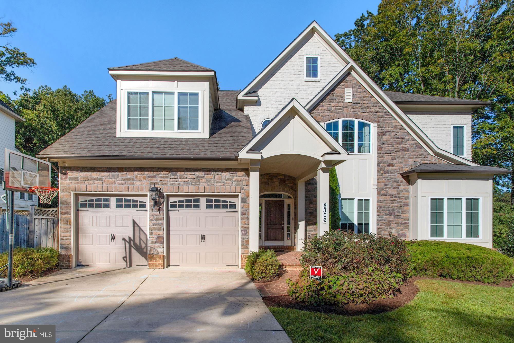 NEW PRICE!! Located in one of Bethesda's premier neighborhoods renowned for its friendliness and sense of community, this Woodhaven escape offers turn-key convenience, a flexible and open floor plan, and stunning views of gardens and nature from almost every window while still minutes from downtown Bethesda. Sited on a 16,286 Sq Ft lot, between River Road and Bradley Boulevard, and walkable to Beech Tree and Hillmead Parks, this 5 Bedroom, 4 and a half bath 2012 transitional Colonial features a Gourmet Chef's Kitchen equipped with stainless steel appliances and a sizable, light-filled breakfast room, graciously appointed principal rooms with soaring tray ceilings and private library, an expansive Primary En Suite with dual entry custom walk-in closet, a fully- finished walkout basement featuring a state-of-the-art gym, abundant storage, 2- car garage, and a 910 Sq Ft deck stretching the length of the home overlooking the vast, fully-fenced rear yard - offering multiple opportunities for gardening and outdoor fun.