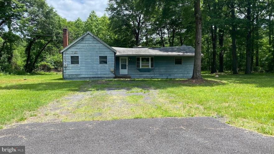 OVER 11 ACRES OF PROPERTY in Bryans Road, partially cleared and partially wooded, some marsh at rear of property. Price reflects that the value is in the land - existing electric, septic and drilled well on property. House could possibly be renovated, but needs extensive amount of work, or tear down and rebuild.  Not too far from Marshall Hall and the River. Imagine the possibilities! 210 corridor and easy commute to DC, National Harbor and  Northern VA.  Sold Strictly in AS-IS condition!