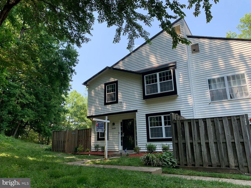 BACK ON THE MARKET - BUYER HAD COLD FEET . Beautifully remodeled home in move-in ready condition.  The townhouse in tucked away at the end  with a fenced yard and patio.  The main level features a kitchen with stainless steel appliances, sleek black countertops and  backsplash. The new a bar/counter extends into the  dining area. The fireplace in the living room area makes for cozy nights.  There is hardwood floor throughout the main level and carpet on the upper bedroom level. The big window in the stairwell to the bedroom level, allows for the beautiful natural lighting. This lovely townhome is well situated near public transportation, the Campus Way shopping plaza, Prince County Community College, 495 and Sixflags . Come to see all that the home offers that I could not list here, its impressive!