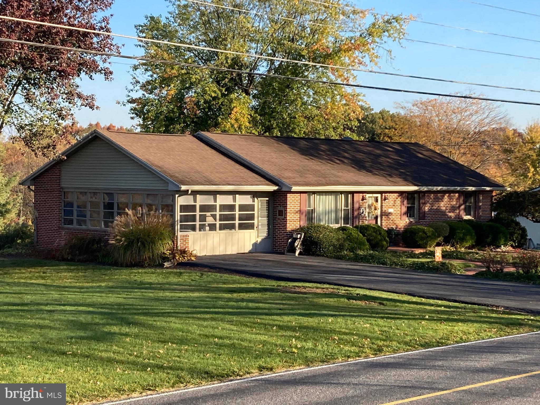 Meticulously cared for by original owner since built in 1964.  This 3 bedroom, 1 1/2 bath all brick rancher on 1/3 acre lot has a great hilltop view located just west of Chambersburg.  Entertain in either the large living room or the open sunroom.  Hardwood flooring is available under the carpet.  Storage shed in the private backyard.  Enjoy the sunset from the back patio.