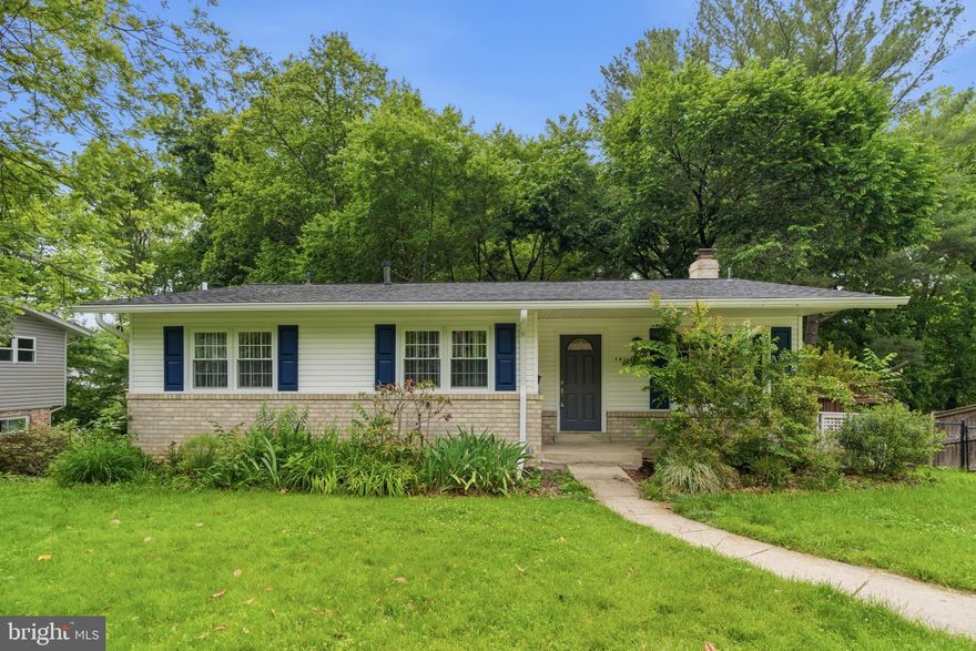 Rare opportunity in sought-after Bel Pre Woods! This beautifully updated rambler sits on a prime half-acre+ lot that extends beyond the fence line to the stream, offering privacy and a picturesque natural setting in one of Rockville’s most desirable neighborhoods.

The main level features an open-concept living and dining area with gorgeous refinished hardwood floors throughout. The dining room opens through a large sliding glass door to an expansive deck overlooking the spacious backyard — perfect for entertaining or relaxing outdoors. The renovated kitchen is equipped with rich dark cabinetry, granite countertops, abundant storage, and a floor-to-ceiling pantry.

Three bedrooms are located on the main level, including a charming secondary bedroom with designer chevron wallpaper, another bedroom with a built-in Murphy bed, and a spacious primary suite with a private en-suite bath. A second full bathroom completes the main floor.

The fully finished walkout lower level offers endless flexibility with a large recreation room featuring a cozy fireplace, a fourth bedroom ideal for guests, an au pair or nanny suite, or a private home office, plus an additional full bathroom. You’ll also find a laundry room with full-sized washer and dryer. Step outside through the rear slider to a screened porch — the perfect spot to enjoy warm summer evenings while overlooking the fenced backyard.