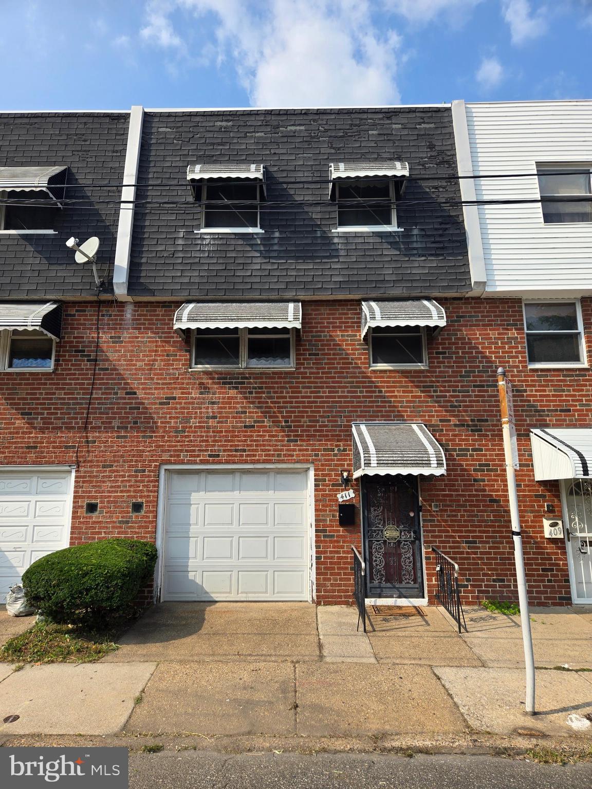 Your chance to buy a rare 1970's built split-level in South Philly that boasts a garage and central air. This home has 3 bedrooms, 3 bathrooms, an expansive living room with extra tall ceilings, a large eat-in kitchen and formal dining room, and a large yard accessed from the finished lower level. Conveniently located near public transportation, shopping areas and major highways. The perfect chance for a first time home buyer or investor looking for a quick flip. With the added opportunity to convert the lower level and garage into an in-law suite, as was done with identical homes on the block. The property needs work and is being sold as-is, which is reflected in the asking price. Expected after repair value is in the mid $400's. Title has been ordered and the seller requests that Buyer use Seller's Title Company.