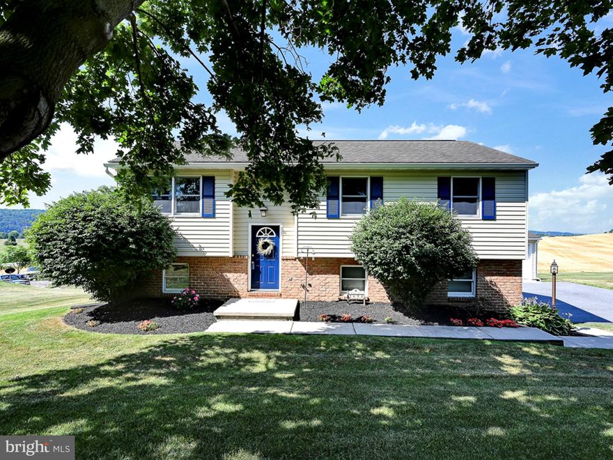 Beautiful Country Setting  for this Outstanding bi-level with preserved farmland behind you.  This well maintained home offers a bright and sunny kitchen with a cozy sunroom. Plenty of cupboard and counter space in the kitchen. 3 br 1.5 bath. Lower Level Recreation room with walk out to 19 X 11 Composite deck. So much space to relax inside and out in this home. Lots of room for friends and family to enjoy the almost 1/2 acre lot. 2 car garage plus an additional 2 1/2 car Detached garage with so many possibilities and additional storage above. Many newer appliances < 5yrs old.  Close to Route 30 and 283. Easy commute to Lancaster , Harrisburg or York. Make this home yours and enjoy the area fireworks from your new yard!
