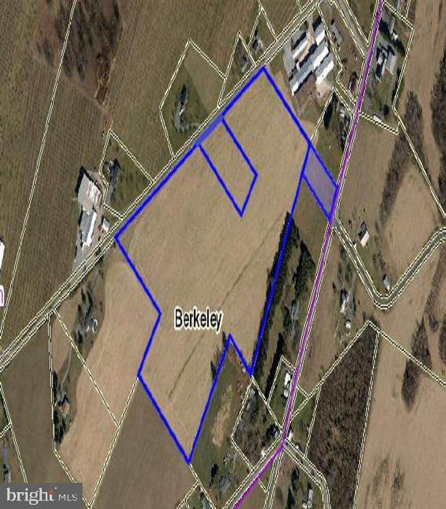 30.13 Acres Agricultural Land.  Great Road Frontage.  Unrestricted Zoning with well and septic in place.