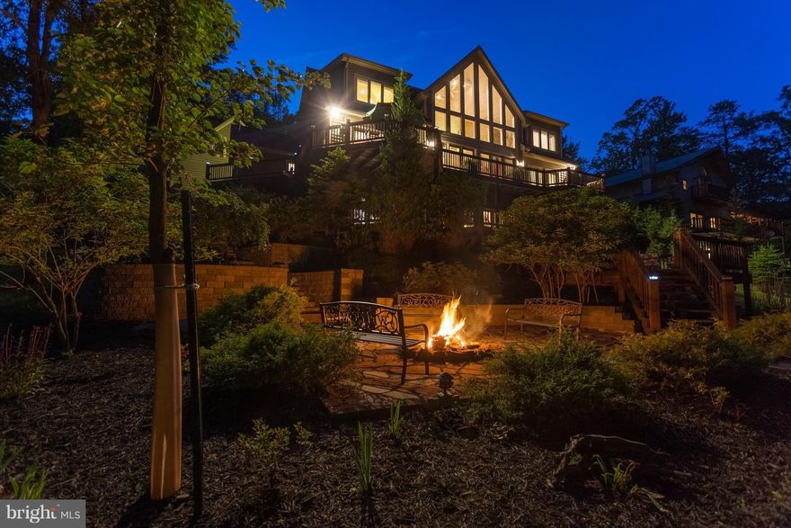 An open concept main level with astounding floor to ceiling windows will capture your attention the moment you enter the foyer. The residence encompasses 5 bedrooms, 4 master suites, each offering abundant space for relaxation, sleep and storage. This is the perfect for a vacation home or full time residence, this home is ideally positioned to enjoy all four seasons at Deep Creek Lake!