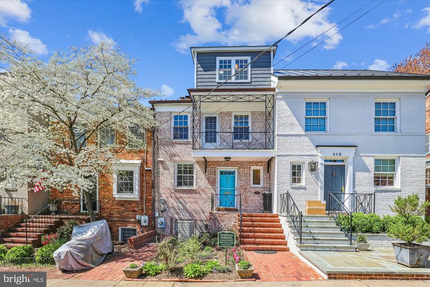 Welcome to 821 S Lee Street, an exquisite four-story residence that offers the perfect blend of historic charm and modern amenities, making it a dream home in the coveted SE Quadrant neighborhood of Yates Garden.

The top floor is dedicated entirely to the private and lavish primary suite, featuring a spacious bedroom, a cozy fireplace, an expansive walk-in closet, ample storage, and a luxurious en suite bathroom, providing a personal retreat within the home.

On the first upper floor, you'll find the second and third bedrooms, thoughtfully designed to share a convenient hall bath. The third bedroom boasts its own private balcony, perfect for enjoying peaceful moments outdoors.

The main level features an open-concept layout ideal for entertaining, with a comfortable living room complete with a fireplace, a stylish dining area, a powder room, and a functional L-shaped kitchen that will inspire your culinary adventures. The lower level contains the recreation room, 4th bedroom and its en-suite bath. This lower level has walkout steps to both the front and back yard. 

Step outside to the screened-in back deck, leading to a spacious, carefully maintained garden and a fenced backyard oasis. The front yard also offers a charming garden bed and a picturesque front porch, enhancing the home's curb appeal. This property conveys with one deeded parking space. 

Located just steps away from the Mt. Vernon Trail and Jones Point Park, this residence is a stone's throw from all you could want and need. This home is within walking distance of parks, dining, the vibrant heart of Old Town, and the Waterfront, making it a prime spot for those who appreciate convenience and culture.