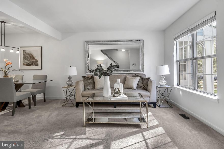 SHORTSALE/THIRD PARTY APPROVAL REQUIRED:   1,800 foot square townhome in the sought-after Montclair community.    The home entails three spacious bedrooms with a fourth in the basement that could be used as  a bedroom or an office.   Full bath in basement with a walk out to the back yard  Fireplace in basement.   Gorgeous deck backing nature and woods for exclusive privacy.     Modern kitchen and pantry.  2 assigned parking spaces with guests parking available.    Convenient to dynamic shops,  movies, dining, and entertainment.     Close to Quantico Marine Base and Fort Belvoir Army Base.  Convenient commuter lots/transportation to Washington, DC and Pentagon so that you can relax before work.   Bring in the New Year right in this stunning home!  Staged furniture is no longer inside of home.