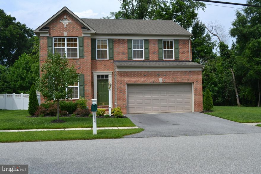 Best deal on a Koch Home ever!This colonial features 4 BR, 2.5 BA w/ upgraded ceramic tile, 42" maple kitchen cabinetry, and SS appliances. Hardwood flooring in spacious foyer, kitchen, & powder room. Security system, second floor laundry room, two car garage, upgraded landscaping, irrigation system & beautiful paver patio compliment the private corner lot that backs to wooded forest conservation.