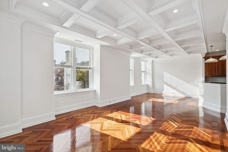 Updated and beautifully maintained two bedroom, two bathroom residence at The Barclay. This home features original details, modern updates, luxurious finishes, and chevron wood flooring throughout. Enter through a foyer into the great room with crown and baseboard molding, a gorgeous decorative ceiling, and nice natural light. This is a wonderful space for living, dining, and entertaining. The updated kitchen boasts cherry wood cabinets, dark quartz countertops, and stainless steel appliances. At the other end of the unit is the stunning primary suite with a large walk-in closet and beautiful primary bathroom. The primary bathroom is appointed in marble and features a double sink vanity, stall shower, jacuzzi tub, and access to the washer/dryer. The second bedroom has a closet and ensuite bathroom also appointed in marble with a stall shower. Residents of The Barclay enjoy a 24-hour doorman, fitness center, chauffeur driven Mercedes, on-site management, and individually controlled heating and air conditioning. Stephen Starr’s Barclay Prime steakhouse is located on the building’s ground floor.