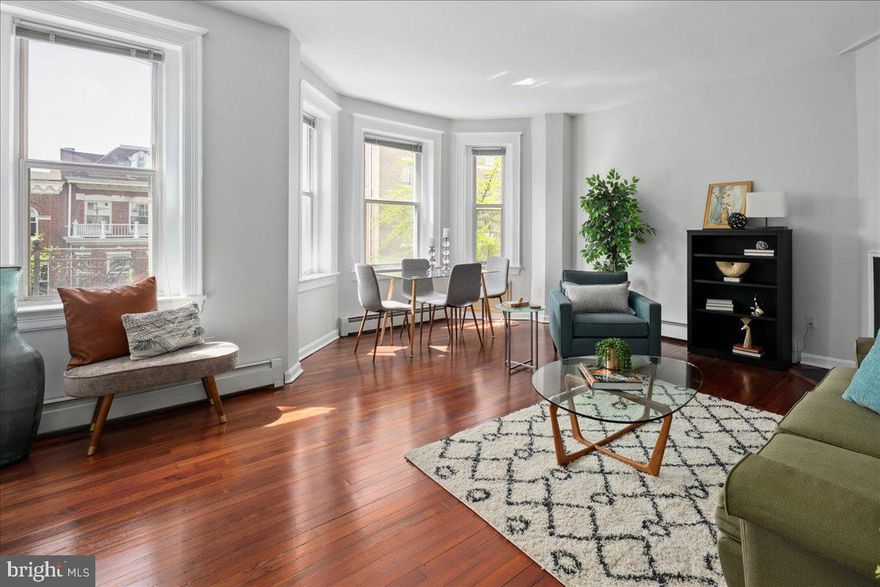 Blending historic charm with impressive modern upgrades, this spacious 750 sqft, fully upgraded, 1-bedroom condo in the heart of Adams Morgan, offers the best of DC living in an iconic 1911 French Renaissance building! The spacious layout boasts a designated dining area, plenty of work-from-home space, walk-in primary closet, soaring 9' ceilings, abundant natural light, and large south facing windows with views of the tree-lined street. WHAT MAKES THIS AN EXCEPTIONAL CONDO? Above average 1 bedroom square footage at 750 sqft, completely renovated kitchen (2024), updated bathroom (2024), freshly painted (2025), gleaming refinished hardwood floors (2025) and all meticulously maintained by a loving owner of 20 years. WHAT MAKES THIS COMMUNITY STAND OUT? The Belmont is quintessential Washington DC charm with 24 units over five floors. Amenities include complimentary laundry facilities, and bike storage. Washer dryers can be added to the unit pending board approval. All Utilities except electric are included in the condo fee of $740 and rental parking options are available in nearby garages. While located on a peaceful and charming street, the building is also situated steps to all that Adams Morgan has to offer. A PREMIER LOCATION With a walkscore of 97, this unbeatable location is walkable to endless restaurants, cafes, fitness studios, shopping and parks. To name a few Streets Market, Safeway, and Yes Organic are around the corner and Dupont Circle, Adams Morgan, and Woodley Park neighborhoods are all walkable. Don’t miss the chance to live at The Belmont! OPEN HOUSE Saturday May 3rd from 11am-1pm