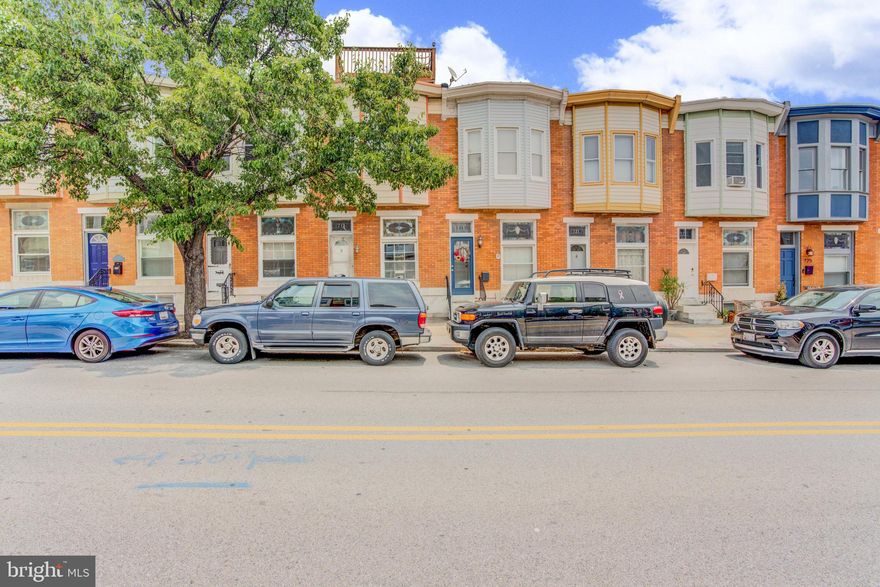 Charming Canton home w/ superb location! 2 over-sized bedrooms, 1 bath, previously updated kitchen, partially finished basement w/ possible 3rd bedroom w/ laundry and workshop. 1 - car off-street parking.  Enjoy sweeping city views from your roof terrace. Short walk to Patterson Park, Canton Water Front Park and Canton Square.