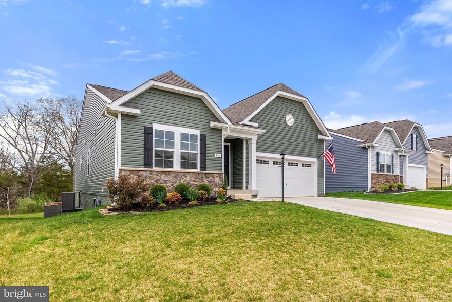 This gorgeous ranch style 3320 square foot home is turn key ready with  all of the builder upgrades in the desirable Overlook at Riverside subdivision in Falling waters! Step into this home and be impressed by all the upgrades, tasteful decor and spacious layout.  The main level boasts upgraded flooring, upgraded countertops with oversized island and upgraded cabinetry, a beautiful stone fireplace, custom built ins, impeccable board and baton with 3 spacious bedrooms and 2 full bathrooms. The owner’s suite is equipped with plenty of natural light, a large walk-in closet and master bath with upgraded tiling. The lower level features a fully finished basement walk out basement with an additional 4th Bedroom and additional 3rd full bathroom with ample additional living space. Spacious fenced in back yard with a beautiful Trex deck, and lower-level patio for all your entertaining needs!  This home is equipped with a top-notch UV water filtration system, and fantastic alarm system.  No need to wait for new construction when this home has all of the upgrades and is omove-in ready.   HOA includes several amenities such as: Dog park, playground, tennis court, Basketball court, picnic areas, and snow removal. Perfect commuter location within minutes of I81. Grocery stores, Gas stations and restaurants nearby. Don't miss out on this beautiful home!