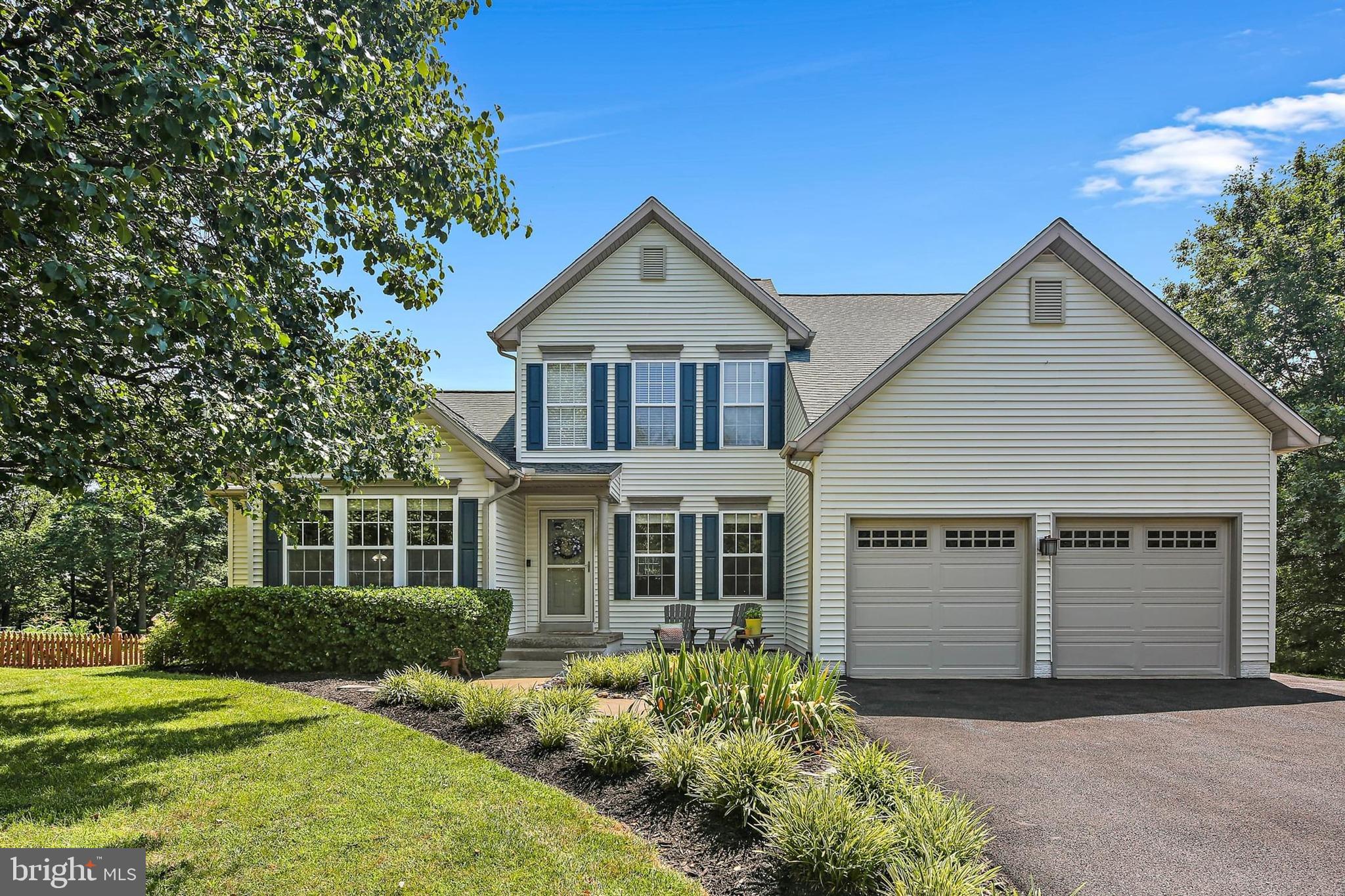 Welcome to 8322 Jordan Valley Way – A Rare Find in Clover Hill! Tucked away in one of Frederick’s most desirable neighborhoods, this meticulously maintained home sits on just under an acre of private, tree-lined land—offering the perfect balance of comfort, space, and tranquility. Step inside to discover beautiful hardwood floors throughout the main level and a thoughtfully designed layout that includes a bright home office with lovely views of the front yard. The spacious main-level primary suite is a true retreat, featuring a recently renovated spa-like bath with a luxurious walk-in shower. The heart of the home is the two-story family room, where soaring ceilings and windows, and a brick wood burning fireplace create an inviting space filled with natural light. The stunning, newly renovated kitchen boasts custom cabinetry, gleaming white quartz countertops, stainless steel appliances, a custom-built pantry, and sliding doors that open to a large deck—perfect for outdoor entertaining. Just off the kitchen, you'll find a roomy laundry area with access to the two-car garage, as well as a convenient powder room. Upstairs, two generously sized bedrooms share a full bath, while the open loft offers flexible space for a home gym, office, or easy conversion into a third upper-level bedroom. The finished walk-out lower level is made for fun and relaxation, complete with a built-in bar, large rec area, a fourth bedroom, and a third full bath. Sliding doors lead to a patio in the fully fenced backyard—a serene, oasis ideal for gatherings, pets, or peaceful morning coffee. With one of the best lots in Clover Hill, this home offers the privacy you crave, the space you need, and the updates you'll love. Don’t miss your chance to own this exceptional property—schedule your private showing today!