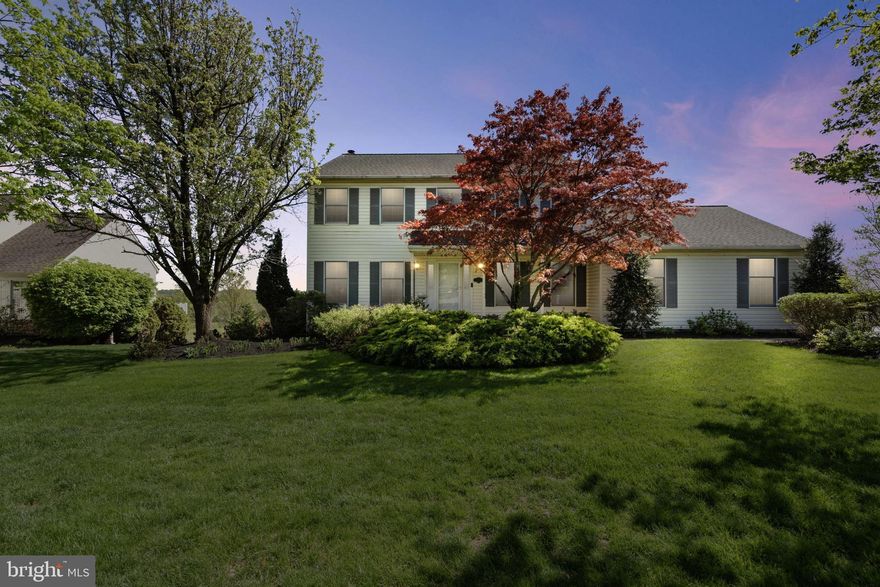 If hosting loved ones in a tastefully updated, spacious home with breathtaking, unobstructed MILLION DOLLAR VIEWS sounds like your dream, this exceptional opportunity is not to be missed. From the screened-in porch to the expansive Trex deck featuring a hot tub and retractable awning, this home is designed for both relaxation and entertaining. This classic 4-bedroom, 2.1-bath Colonial has been freshly painted and offers a timeless traditional floor plan. Step into the gracious foyer and immediately notice the pristine hardwood floors flowing throughout the home. A formal living room with French doors and an elegant dining room, both rich in character, flank the entryway. At the heart of the home is a stunning gourmet kitchen featuring an oversized island with seating, stainless steel appliances, custom white cabinetry with under-cabinet lighting, a wine fridge, and a neutral color palette. Adjacent is a sun-filled eat-in area with vaulted ceilings, custom moldings, and wainscoting—a perfect gathering space full of charm and warmth. Glass French doors open to the screened-in porch, an ideal setting for enjoying peaceful moments with family. Continue to the deck where the hot tub and panoramic views promise year-round enjoyment. An updated powder room is conveniently located between the kitchen and the cozy great room, which features a large box window and a wood-burning fireplace. A well-designed laundry/mudroom with side entry is situated off the kitchen and also connects to the oversized two-car garage. Upstairs, double doors lead to a serene primary suite featuring a spacious walk-in closet with a dressing nook. The en-suite bath offers a frameless glass walk-in shower, double sinks, a Jacuzzi tub, and a wall of windows that frame the stunning views. Three additional generously sized bedrooms with ample closet space share a neutral hall bath with updated natural stone counters. The finished walk-out lower level offers additional living space for lounging or recreation and includes a pellet stove, dry bar, and mini fridge. Sliding doors lead to a landscaped backyard complete with a gardening station and wide-open views. Located on a quiet cul-de-sac in the sought-after Central Bucks School District, this home includes numerous updates: a newer hot water heater, Carrier HVAC system, and a Generac generator. Just minutes from the vibrant charm of downtown Doylestown's restaurants and boutiques, this home offers comfort, style, and unmatched scenery. Schedule your private showing today!