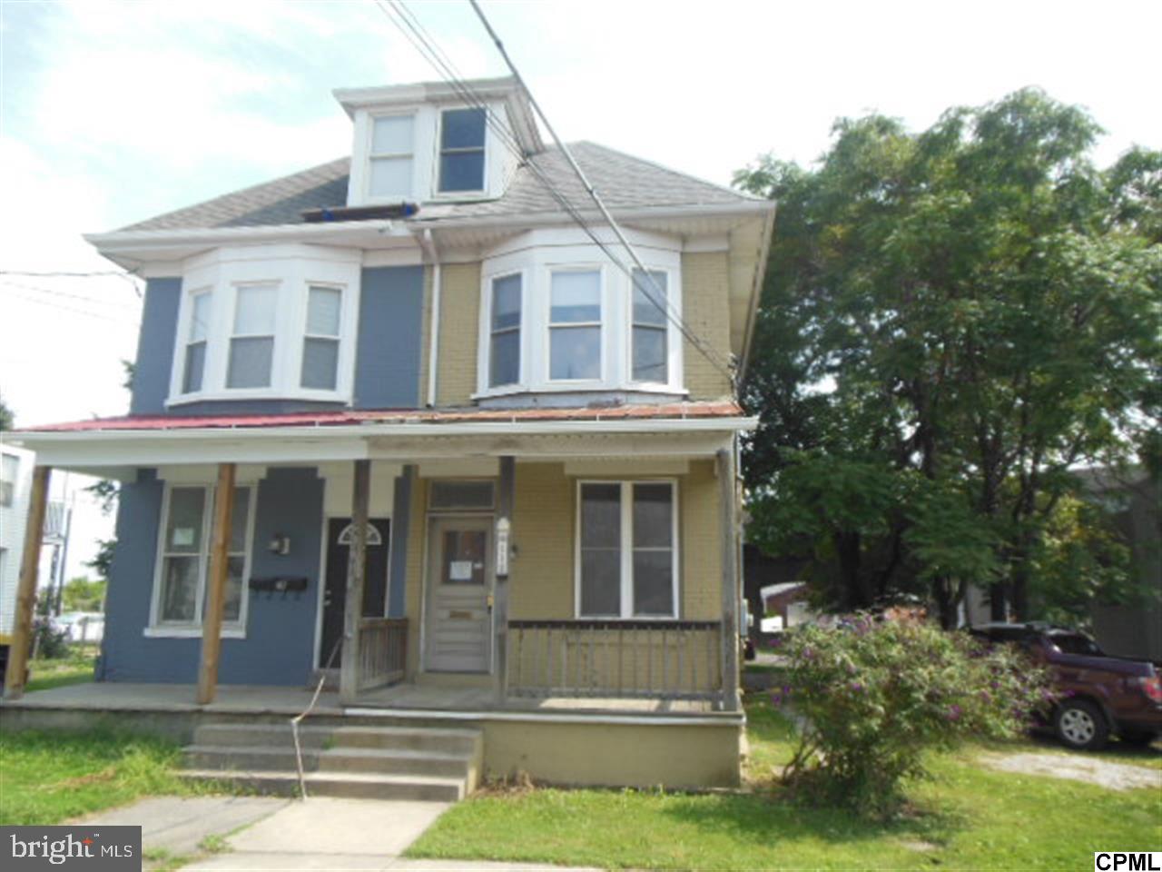 Traditional 3 story home with 5 bedrooms and 1.5 baths. Open front porch. Off street parking. Deck off of kitchen in the rear. Show and sell! Equal Housing Opportunity.