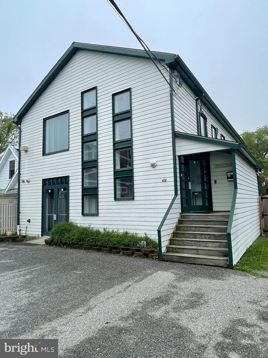 Diamond in the rough! Nestled in the center of Eastport, this two story building is zoned for residential use.  It has been an office building for many years and is ready for its transformation to residential.
The floor plan is attached.  This is 3,000 square foot plus building with approximately 10 parking spaces and area in the back of the property for expansion. 
There is a view of the capital from the second level, 10 skylights throughout the building, a curved staircase in the entryway, and a raised library area with extensive built in bookcases and a wet bar.  Also, there are three separately zoned HVAC systems. This property is also listed as commercial. See listing MDAA2037464.
Showings are by appointment only. Call agent 24 hours in advance to show. Showing time is not being used for this listing.
