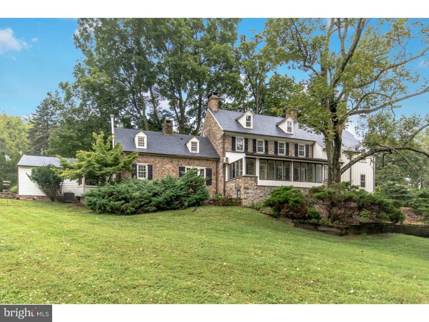 SALE PENDING  Set on rolling hills, this wondrous gentleman's farm sits on 54 preserved acres. Just thirty-five miles north of Philadelphia, scenic New Hope Pennsylvania is unparalleled in beauty and steeped in history. A gated entry from a quiet country road leads to the meandering drive past spring fed ponds and centuries old trees framing the 1786 built manor house. The exterior is elegant and timeless, with pointed stone, board and batten siding, and a newly updated slate roof. Contemporary comforts blend flawlessly with random width oak and pumpkin pine floors, deep silled windows, and beamed ceilings in the three-story residence. Wood burning stone fireplaces bring warmth and ambiance to entertaining areas on the main level and to the private master suite - one of four tranquil bedrooms. The charming breakfast room with exposed stone stands adjacent to a sunny, modern kitchen with custom white cabinetry, granite countertops, and center island. The exceptional grounds are a delight to roam. A wisteria-laced terrace, stone walls, groomed gardens, and two springhouses are found along the way. A guest cottage offers sweeping vistas of the countryside, and the swimming pool with waterfall and pool house provide cool shelter during lazy summer days. Venture to the heart of bustling New Hope and neighboring Lambertville for a night on the town with sumptuous dining, shopping, and cultural experiences. A secluded slice of heaven, a respite from life's fast pace, and a memorable estate home that friends and family will escape to and reflect on for years to come, Twin Creeks is a treasure to behold.