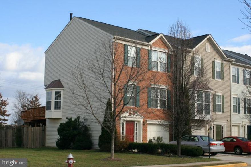 Pristine 2082 sqft of totally REMODELED! Granite Countertop, Fresh Paint, New Carpet, Stainless steel  appliances, near DULLES, 1 GARAGE TOWNHOME W/3 LEVEL EXTENSIONS FOR LOTS OF SPACE! 2 LARGE MASTER BEDROOMS EACH WITH OWN BATH (1 W/LUXURY BATH)! GOURMET KITCHEN W/CENTER ISLAND & TERRIFIC SUNROOM W/GORGEOUS GAS FP!, Lower level maybe used as a bedroom/recreation room, has it's own rear entrance.