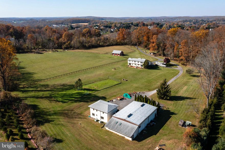 Welcome home to 280 Moore Rd- your own private retreat on 15+ acres in Downingtown School District featuring a 3000+ square foot contemporary style home, 5 stall Amish built barn with tack room, heated industrial shop building with additional workshop, and 2 story office building. This property sets secluded down a private drive yet minutes from all the conveniences the area has to offer- shops, restaurants, major transportation routes, Marsh Creek State Park and less than a mile from Shamona Creek Elem and Marsh Creek 6th grade center. The possibilities here are endless. Walk up the brick walkway to the 4bedroom, 3 full bath home. The unfinished house, featuring 2x6 construction, was completed when the current owners purchased the property in 1994. This included new electrical, plumbing, insulation, windows, doors, trim and basement flooring. Recent updates include new roofs (2012), water heater (2016), heating system (2016) and well pump (2017).  The first floor features a family room with solid Hickory hardwood flooring(2013), 17’ vaulted ceiling, skylights and a wood burning stove(2011) which heats the house in all but the coldest days. There is also a dining room, pantry closet and a large kitchen with breakfast area. The kitchen has an abundance of custom cabinetry and stainless appliances. There is also another room currently used for an office but can also be used as a 4th bedroom.  A full bath and laundry room with interior access to the oversized 2 car garage complete  this floor. Upstairs there is a large owners’ suite with Jacuzzi and custom 60x36, 2 sided glass shower, 2 other generous sized bedrooms, a hall bath and a 4th room which can be used as an office, a bedroom (just needs a closet), walk-in closet, exercise room or nursery. The expansive unfinished basement provides plenty of storage space and bilco doors to the outside. Outside, there curved brick walks and a beautiful herringbone brick patio for you to relax and enjoy the tranquil views of the large organic garden. The property is relatively flat and allows plenty of uses- one of which is for horses and farm animals. The barn (1994) has 5 12x12 run-in stalls, a tack room, 8’ concrete isle, a full hay loft, water and electric. There are 2 pastures- one is 2.5 acres and the other is almost 6- the current owner hays the large pasture and everything has been well maintained.  The 40x60 heated industrial building/machine shop with 14 foot ceilings perfect for a hobby enthusiast or to store boats, cars etc. There is also a connected 16x40 heated workshop with skylights and windows. The 2 story office building is 1532 sqft. The owners ran a small business from this building and has electric, water, sewage, a separate heat pump per floor, numerous office suites, a meeting room, a kitchenette, and a bathroom.  The building could be converted to other uses, such as an in-law suite. This property is a hidden gem in bucolic Chester County. It is protected by ACT 319.  SUBDIVISION is possible without losing ACT 319 status . All buildings are connected by data wiring and a security system, including fire detectors in barn. With so many possibilities, it is highly advisable that buyers considering the property for anything other than their own residential space should do their due diligence about permitted uses. Sellers are flexible with settlement. Do not miss this opportunity. .