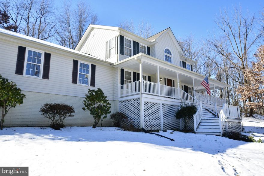 3 bedroom, 3.5 bath home on 1 acre in highly desirable Middletown School District! Kitchen has granite counters, hardwood floors throughout main level, oversized 2 car garage and over 500 sq ft of covered wrap around porch highlighting amazing views!  Master suite has vaulted ceilings, soaking tub, stand alone shower and a walk-in closet.  The elevated property is adorned with mature trees and 1000's of spring time flowers!!  The home includes a finished basement and an oversized garage.   Plenty of privacy and great views await from the wrap around porch!! The home needs TLC.  The roof is 3 years old and is complete with gutter guards.  This has the opportunity to be made yours with some cosmetic updates!