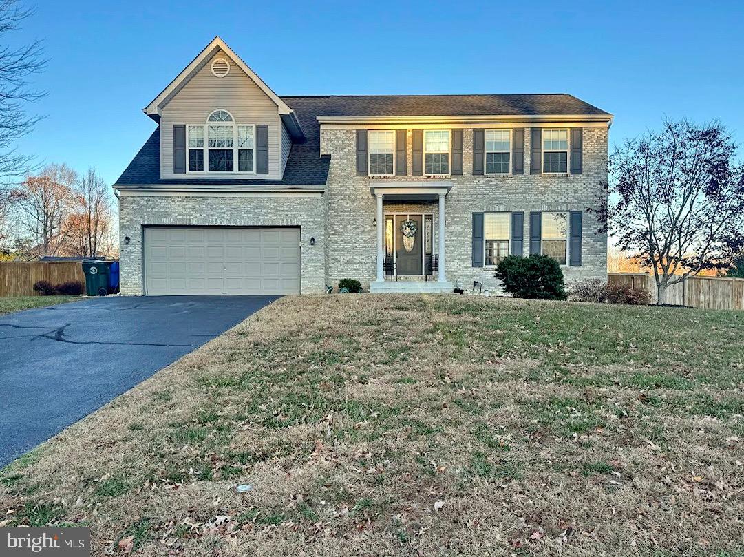 This beautiful large corner lot home, designed for comfort, entertainment, and endless enjoyment. The spacious deck and fully fenced-in backyard include a fantastic 30x30 basketball court with an adjustable Mega-Slam hoop and Courtbuilder Powergame flooring system, making it a sports enthusiast's dream! Inside, the luxurious master suite offers a cozy sitting area and a spa-like master bath with a soaking tub and separate shower. The kitchen shines with stainless steel appliances, Corian countertops, and hardwood floors, flowing seamlessly into the dining room, enhanced by chair rail, box molding, and crown molding. The walk-up basement has been thoughtfully transformed with newly installed Dura Lock Rubber Tiles, creating a versatile space that includes a gaming area and a setup perfect for the baseball enthusiast. A charming brick hearth & flue ready for your wood/pellet stove needs to add warmth and character to this inviting area (when not in baseball training mode). Additional updates include a new dryer (2024), water heater (2018), HVAC system (inside and out, 2020), roof (2017), and updated garage and front doors (2019). This home offers the perfect blend of style, functionality, and outdoor recreation.