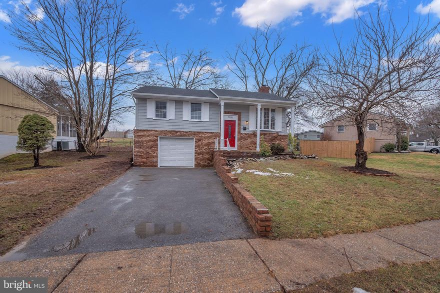 Welcome home to this 3 bedroom, 1 bathroom home with one-car attached garage in Hagerstown! Walk up to a spacious living room area with gleaming hardwood floors all throughout this level, reflecting the abundant natural light from the large bay window. Make your way through the dining room into the kitchen with glistening stainless steel appliances including a french door refrigerator with pull out freezer and ample cabinet and countertop space - making meal prep a breeze! Enjoy three-season outdoor dining on the screened-in back porch - the perfect place to entertain friends and family. Down the hall of the upper level you will find three spacious bedrooms with closet storage and a full hall bathroom. The partially-finished lower level includes a finished family room with a beautiful brick fireplace as well as additional storage space. Conveniently located near numerous shopping and dining options, make this home yours today!