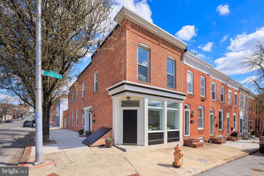 Welcome to 1001 S. Bouldin Street, a beautiful, 16’-wide, end-of-group brick row house in the heart of Canton, where charm meets modern convenience. Once a storefront, this home has been thoughtfully refreshed while maintaining its historic character.

Step inside to a move-in ready home, with gleaming hardwood floors flowing throughout the main living spaces and an abundance of windows inviting lots of natural light. The spacious kitchen features stainless steel appliances and plenty of counter space creating ample room to cook, entertain, and gather. Freshly painted from top to bottom—including the ceilings and trim—this home feels crisp, clean, and effortlessly inviting. New hardware on the doors adds a polished touch, and the main-level laundry room means no more trekking up and down stairs just to wash a load.

The main level also boasts a highly coveted half bath and hall coat closet. The finished basement offers flexible space for a home office, gym, or cozy den. Upstairs, you will find 2 spacious, carpeted bedrooms at opposite ends of the home.  The primary bedroom includes a large walk-in closet, an ensuite bath with a jacuzzi tub and double sinks, and access to a space primed for a deck. And if you're dreaming big, take it one step further—a roof deck with stunning water views could be in your future.

And let’s not forget the rare bonus: a one-car garage, offering secure parking or extra storage. Outside, the home’s all-brick exterior is complemented by freshly painted cornice and doors, adding a pop of charm to this standout property.

Perfectly situated near Canton Square, Patterson Park, and the waterfront, this home is an urban retreat with room to grow. Schedule your viewing today and make this exceptional property your own