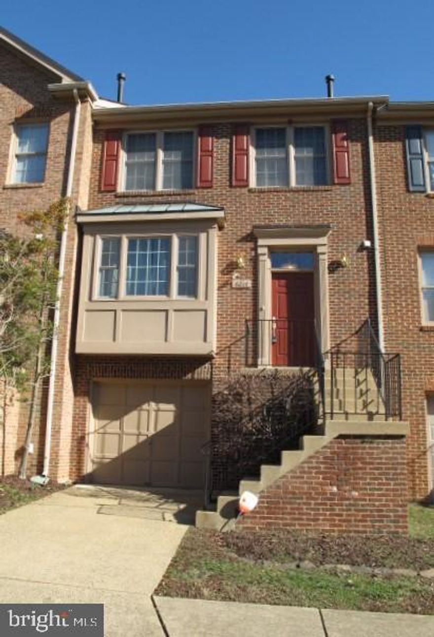 Beautiful garage townhouse available! Features include a renovated gourmet granite and stainless kitchen that opens to bright living & dining rooms, hardwoods throughout main and bedroom levels, and plenty of built-ins & recessed lights.  The master suite has large walk-in closet, vaulted ceiling and luxurious updated bath.  Downstairs, you'll find a spacious family room with gas fireplace, plus separate laundry room.  Entertain on the Trex deck!  Small Falls Church community conveniently located just minutes to 7 Corners & East Falls Church Metro stop. No pets, sorry.