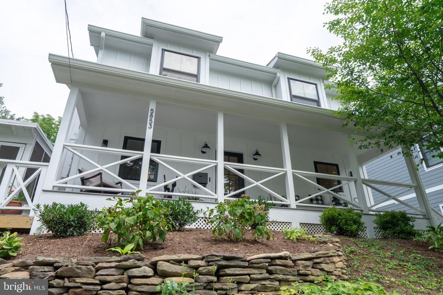 Beautiful Modern Farmhouse magnificent renovated & expanded in 2018 by Lauren Malone,  features board and batten siding, a metal roof and black framed windows. Spacious front porch with custom cross bar railing. 3 finished levels with an attic for storage, Eco finishes hardwood floors, smart home lighting, thermostat,  and  smoke detectors. Designer finishes, an open floor plan, overlooking beautiful gardens, fish pond and sun room. Elegant living room with windows to flood the space with natural light. Spacious dining room, In the Gourmet kitchen quartz countertops, hardwood floors,  island counter top, Thermador brand appliances ( burner range, hood insert w/1000 cfm blower, dishwasher, wine refrigerator, french door custom panel fridge) built in fridge, counter to ceiling style cabinets with a second row of glass uppers, farmhouse sink and islander prep sink and Walk-in pantry. A bedroom/ guest room or office room and a full bath room on the main level. Upstairs, the master bedroom with high ceilings, boast a large build in walk in closet.Luxurious master Bathroom with a dual sink, modern lights and mirrors, custom cabinetry with quartz counter top, two shower heads and one hand spray, above artistic shower feature tile,  circle mosaic,  feature wall in shower, the finest in personal pampering. Down the hall two additional bright and spacious bedrooms and a beautiful appointed hall bath. In the lower level the finished basement with a room  for guest, game room, office, or den/bonus room plus a full bath, then a Laundry room with space for storage offer the versatile space to meet the demands of your lifestyle and complete the comfort and luxury of this wonderful home. There is a parking space and space for parking on the street.The house sits on a dead end street, close to the metro, walk to Parkhurst park and Westover, moments to I-66, East Falls Church Metro and loads of shops and restaurants.