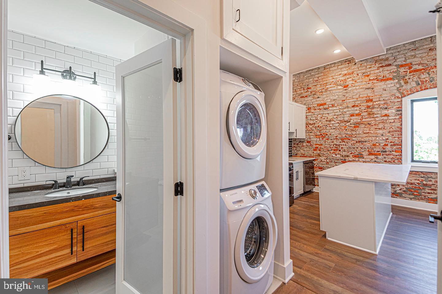 *Available NOW!*
You are going to fall in love with this stunning 1 bedroom, 1 bathroom unit that includes a beautiful marriage of industrial and modern luxury: from the hardwood floors, recessed lighting, central air/heat, and ceiling fans, to the impeccably restored exposed brick, white walls and contrasting black finishes throughout. As you enter the unit, you’ll find the bathroom with a gorgeous round mirror, natural wood vanity with granite top, and white subway tile throughout including the large shower and stackable washer/dryer. Across the hall and through the frosted glass door is the bedroom with soaring high ceilings and closet with a full length mirror and custom organizer mixed with closet rods, open shelving and drawers. The living open floor plan living room features the ultra modern kitchen that’s complete with quartz counter top, breakfast bar, textured black subway tile back splash, white cabinets with sleek black hardware, garbage disposal and black stainless steel dishwasher, microwave, refrigerator and 5 burner gas range with removable cast iron griddle.
Live in this high-end building that features keyless fob entry and smart phone access, wifi thermostats also controlled by your smart phone, an elevator framed in recycled wood paneling, a long well-lit hallway highlighting the flawless exposed brick, and a SHARED ROOF DECK with stunning skyline views. Located in the Hawthorne section of Bella Vista and steps from the Lombard-South Broad St subway station, Washington Square West, Graduate Hospital, Queen Village and more!
Lease Terms: Generally, 1st month, and 1 month security deposit due at, or prior to, lease signing. Other terms may be required by the Landlord, such as last month’s rent upfront. $65 application fee per applicant. Electricity, gas (if applicable), cable/internet, and a $10/mo. technology fee. Water is a flat monthly fee of $60. A $25 service fee, plus the cost of the air filter, will be charged quarterly for routine air filter replacement. Landlord Requirements: Applicants to make 3x the monthly rent in verifiable gross income, credit history to be considered, no evictions within the past 5 years, and must have a verifiable rental history with on-time rental payments. Exceptions to this criteria may exist under the law and will be considered. Cosigners will be considered.
*Price reflects the net effective rent when a 2-week credit is applied at $1,750/mo.
*Limit 1 pet (cat or dog) permitted with owner approval; $500 non-refundable pet fee