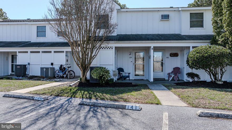 Welcome to your lakeside retreat in the highly sought-after Mallard Lakes community! Ideally located just minutes from Fenwick Island and Ocean City beaches, as well as nearby dining, shopping, and everyday conveniences, this home offers the perfect balance of coastal living and low-maintenance ease. As you arrive, you’re welcomed by a charming exterior and a community known for its resort-style amenities with beautifully maintained grounds.  Inside, the home ope ans to a bright and inviting kitchen featuring white cabinetry, granite countertops, and a casual bar area—perfect for morning coffee or gathering with guests. The layout flows effortlessly into the dining and living areas, where a wood-burning fireplace creates a cozy space for the cold season or a comfortable space to unwind after a day at the beach. One of the standout features of this home is the enclosed porch, designed for year-round enjoyment. Filled with natural light and offering peaceful lake views, it’s the perfect spot to relax, entertain, or simply take in the surrounding scenery and wildlife. Upstairs, you’ll find two well-sized bedrooms along with a full bathroom that is both functional and spacious, offering comfort for both everyday living and guests. This home is being sold furnished, making it a true turnkey opportunity to bring your personal touches and start enjoying coastal life right away or make it your coastal investment.  Mallard Lakes offers a wide range of amenities, including 2 community pools, tennis, pickleball, basketball and volleyball courts, picnic/grill areas, hot tub, playgrounds, and water views - creating a lifestyle that’s as active or as relaxing as you want it to be. With its desirable location, lakefront setting, and move-in ready convenience, this property presents an excellent opportunity to own in one of the area’s most popular beach communities.  Make sure to view the virtual tour and book your appointment today!