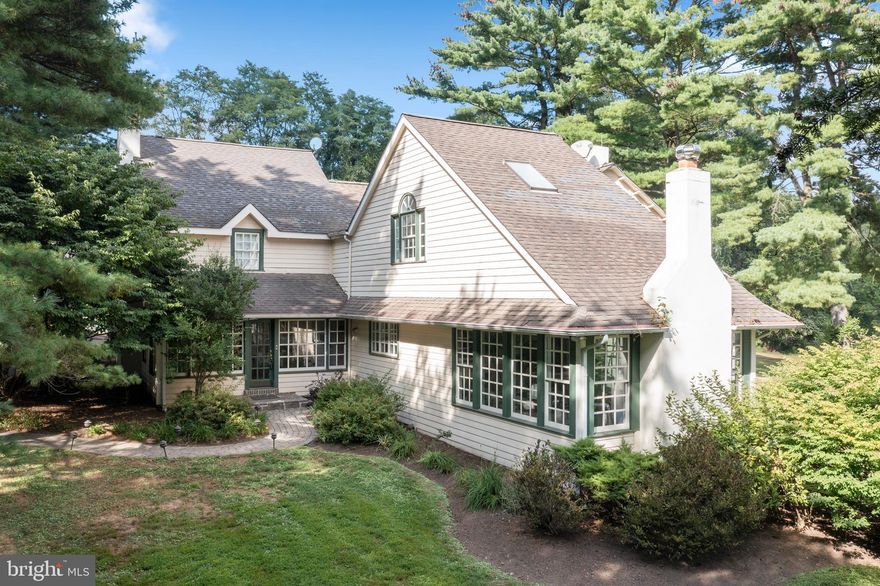 Newcomen Valley farm is the perfect blend of historic charm and modern luxurious finishes.  The main part of the house dates back to the 1800 and has been lovingly upgraded throughout the years.  This 10 acre property features a 4 bedroom 3.5 bath main house, a spacious 1 bedroom carriage house and a barn featuring a party room, storage and 4 stalls!  Down the slate walkway to the main home and enter the foyer and you are welcomed by warm hardwood floors and an abundance of windows!  The open kitchen was meant for entertaining with a large seated marble island, Sub zero refrigerator, double sink,  2 dishwashers and  a double oven! The warm cabinetry, carerra marble countertops and stainless appliances create the perfect country kitchen.  The kitchen is open to the family room featuring wood beamed ceiling, fireplace and an abundance of windows overlooking the idyllic grounds and pond beyond. A formal dining room is also off of the kitchen and accesses the covered porch for al fresco dining, indoor/outdoor entertaining and enjoying the peaceful grounds. A large Living room with a cozy fireplace is one of the original rooms in the home and features deep window sills and  beautiful custom millwork. The den/library addition has warm built-in cabinetry, a gas fireplace, storage closet, powder room and a mud room.  An office/sitting room is situated off of the foyer and is a great space for work from home.  Upstairs the Primary suite is a show stopper with vaulted ceilings in the bedroom, his/hers full baths, laundry room and back stairs leading to the Library.  The stunning Primary bath was renovated in  2019 and features a soaking tub, frameless glass shower with floor to ceiling tile, rainhead shower and body jets, private w/c, double vanity and dressing area.  Behind the sliding barn door is a large walk in closet that provides storage not usually seen in historic homes. Three additional closets complete the primary bedroom. The secondary primary bath (2019) features a frameless glass shower, toilet and vanity for added privacy.  Three additional bedrooms share the renovated hall bath.   The carriage house is a wonderful space for guests, inlaws, home office or an au-pair with its covered porch overlooking the grounds and oversized bedroom, living area and kitchenette, this space offers so many possibilities. The stunning stone bank barn has four stalls on the lower level and on the upper level a finished party room and storage as well as a possible office. Current owners have made significant upgrades to the main house and the carriage house to include a new septic system. All of this is located minutes to Exton, Malvern, King Of Prussia and West Chester, so you get all of the advantages of being in the country but in a convenient location! Don’t miss the opportunity to make this piece of history your own!