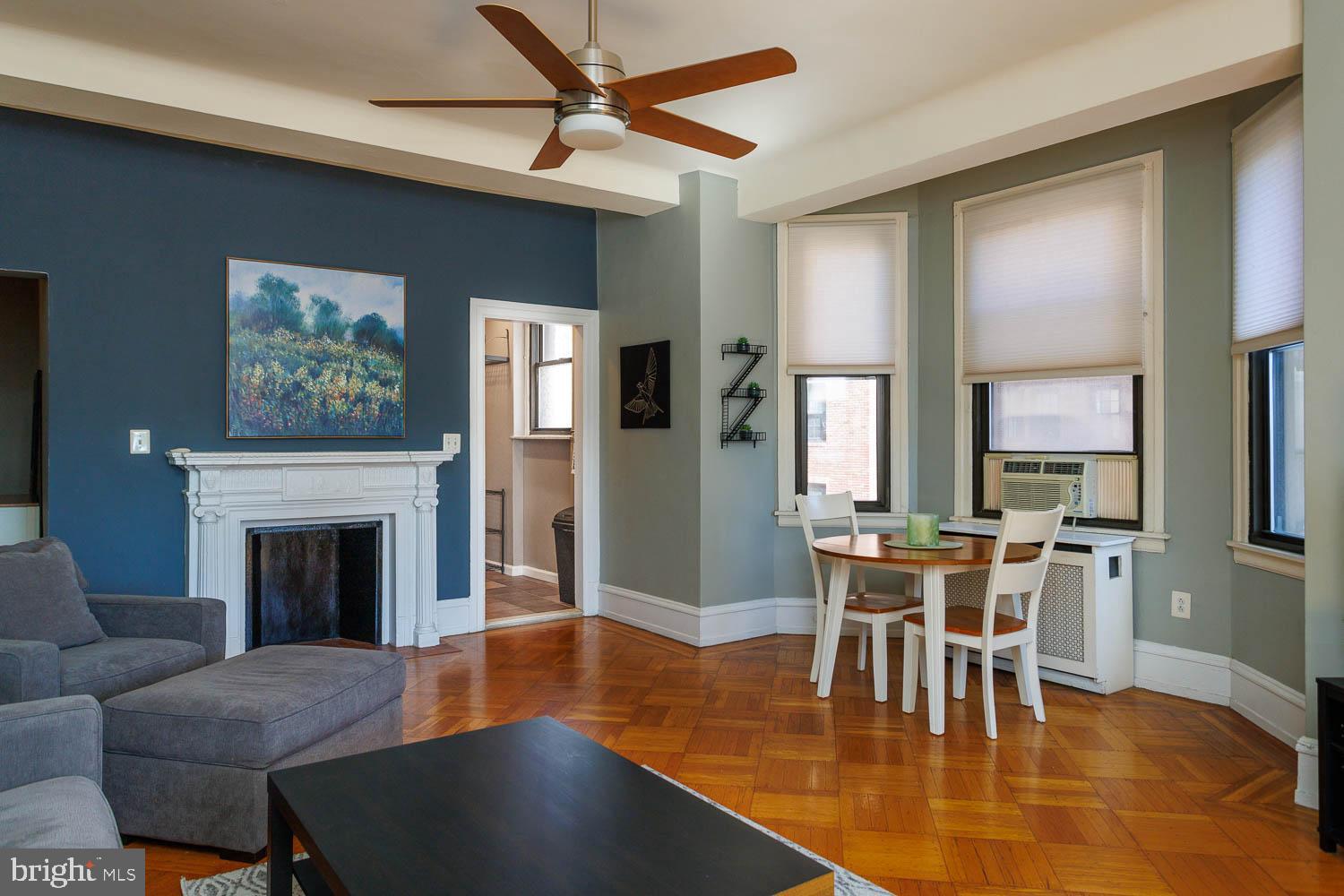 This is a beautifully renovated and maintained corner unit at the Lenox Condominium. This unit is on the southeast corner of the building with great light and views from three bay windows. The kitchen and bathroom have all been completely renovated. The kitchen has custom cabinets, stainless steel appliances and granite counter tops. There is an entry vestibule that provides an elegant introduction to the bedroom on one end and kitchen, living room and dining area on the other. The living room includes an original decorative mantle, ceiling fan, two bay windows and fantastic southern views. The bedroom has two large closets, ceiling fan, another large bay window and a full bathroom. New washer and dryer were installed last year. The association now allows individual owners to install central air conditioning with prior approval by the board, and many owners have installed it. The Lenox Condominium was designed by famed New York architects Clinton and Russell. It was built in 1920 and renovated into condos in 2004-5. The units have large scale rooms, high ceilings, lots of windows and most units have their original architectural elements. It is a Doorman building and is centrally located at the southern end of Mid-town Village in the Washington Square West Neighborhood. It is 2 blocks from the great shops, restaurants, theatres and night life of Midtown Village, Walnut Street and the Avenue of the Arts. It is also just a few blocks from Thomas Jefferson and Pennsylvania Hospitals. There are many public transportation options within a few blocks of the Lenox. The condo fees include a 24/7 door staff, heat, hot water and high-speed internet. The owners pay their own electric and Cable TV. The building offers additional storage for a small fee, and there are many gym options within 2-3 blocks. It is a pet friendly building. There is currently one deeded parking space for sale behind the building in the gated lot.