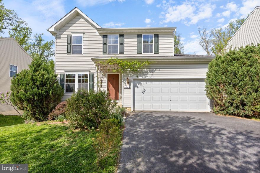 Pristinely maintained and move-in ready 4BR/2.5BA Colonial located on a spacious lot in the quiet neighborhood of Taylor Village.  Enter from the wisteria vine covered front porch overlooking a cul-de-sac street.  Step inside a bright and airy main floor with hardwood floors, a newly painted interior, and an open floor plan. The spacious foyer is open to the large living room featuring two walls of custom bookcase shelving.  Continue past the half bath into the spectacular open concept family room, breakfast room, and kitchen.  The kitchen boasts plenty of cabinets and counter space, beautiful glass tile backsplash, newer appliances, and an island with breakfast seating for two.  From the breakfast room open the sliding door and step outside to a large deck that overlooks the forest-like surroundings. Just off the kitchen is access to the two-car garage from the mudroom/laundry room. The second floor offers Pergo flooring in all bedrooms beginning with three sizable secondary bedrooms, a full bath, and a grand primary suite.  The oversized primary bedroom features a large walk-in closet, and private full bath with a double sink vanity.  The lower level offers additional finished living space featuring a large family room, storage, rough-in for a future bathroom, a workshop area, a walk-in cedar closet, and sliding doors to a paved patio with a stunning view of the surrounding county land offering privacy.  The yard is filled with six different types of fruit trees, raised beds for a vegetable garden, and blooming lilac and magnolia trees.  This home is move-in ready with so much to offer new homeowners, and is located close to Worthington Park, several schools,and in close proximity to several commuter routes, shopping, and restaurants.