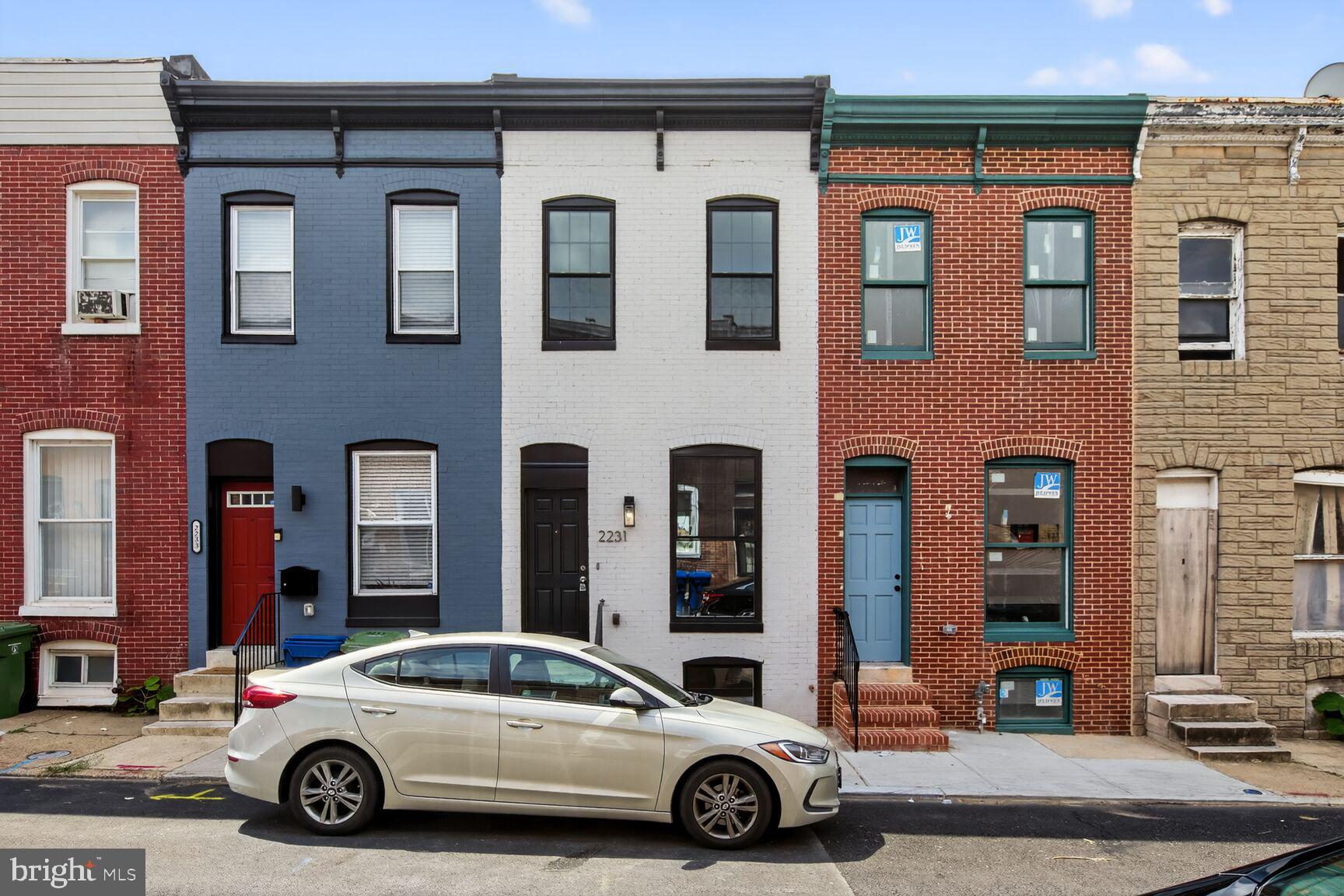 Welcome Home!! Nestled on a quiet, peaceful, low-traffic street, minutes from Johns Hopkins Hospital, enjoy this completely RENOVATED, 3 Bedroom, 3.5 Full Bath Rowhome. Revitalization taking place right on the block and all around. With interest rates soon to fall, ACT NOW before it’s too late. All new in 2025: Luxury Vinyl Flooring, Kitchen cabinets w/ quartz countertops, stainless steel appliances, vanities, new roof, plumbing w/ new water service line from street to house, upgraded electrical panel, HVAC system, water heater and interior drain tile system and sump pump to keep the basement nice and dry. Plenty of headroom in the basement with a bedroom and full bathroom.
Enjoy the spacious deck and accordian style pass through window w/ quartz countertop extending from the kitchen to the deck. Walkout basement w/ Landscaped backyard. Brand new top to Bottom. Don’t miss out on this opportunity to own this affordable rowhome in Baltimore’s Middle East neighborhood.