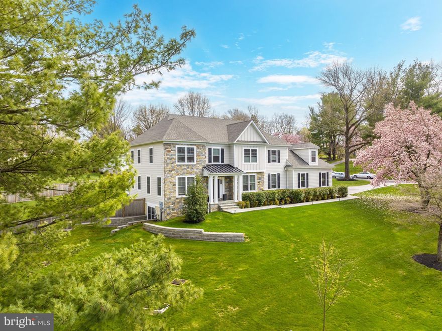 The wait is over, here’s the perfect house in a great location! This exceptional 4+ bedroom, four and a half bath home was recently constructed in 2019 with the current owners adding the finishing touches including a pool, outdoor kitchen area, fireplace with sitting area, gym, and whole-house generator. The open and cozy flowing first floor with center hall, offers a generous home office with custom built-ins added by the seller. Large great room/living room with fireplace and access to covered patio and open kitchen with oversized island, breakfast area, Viking and Thermador appliances and loads of cabinets. Sliders from the kitchen area step out to a large, covered patio overlooking the pool, outdoor grill area and gas fireplace with additional seating. There is also a great mudroom just off the oversized three-car garage. Just at the top of the stairs to the second floor is a great nook, perfect for a second office, or homework station. The large primary suite has two walk-in closets and an extra-large bath with two separate sides/baths with separate vanities, an oversized shower with two access points and soaking tub. Two of the secondary bedrooms share a Jack and Jill bath with double vanity. Rounding out the second floor are a large laundry room, oversized linen closet and fourth bedroom suite with walk in closet. The custom, finished daylight lower level includes a gym, two entertaining spaces, 5th bedroom with full bath and a ton of storage. This immaculate home is in the award-winning Lower Merion school district, and is close to 476, 76, and the shopping and dining of Conshohocken and the Main Line.