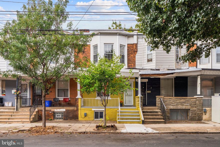 Front porch life is calling your name!  Enter and into the expansive open-layout first floor living area complete with the perfect powder room. Towards the back the large kitchen features sleek countertops, stainless steel appliances, and ample cabinet space. There are rear and side windows for extra light and ventilation. The kitchen leads out back to a private outdoor patio oasis, perfect for entertaining, relaxing, container gardening and generally relaxing al fresco.
The finished basement provides additional living space plus full size washer and dryer and all new sewer line. Big open area—perfect for a family room, home office, art studio or gym. Fully tiled, drywalled, updated with every mechanical—nothing left to do but move in. Located in a vibrant neighborhood, you're just a short walk to local favorites like Ultimo Coffee, South Philly Taproom, and Brewery ARS. Plus, enjoy easy access to Center City, major freeways, and the airport. Don't sleep on this beautiful home!
