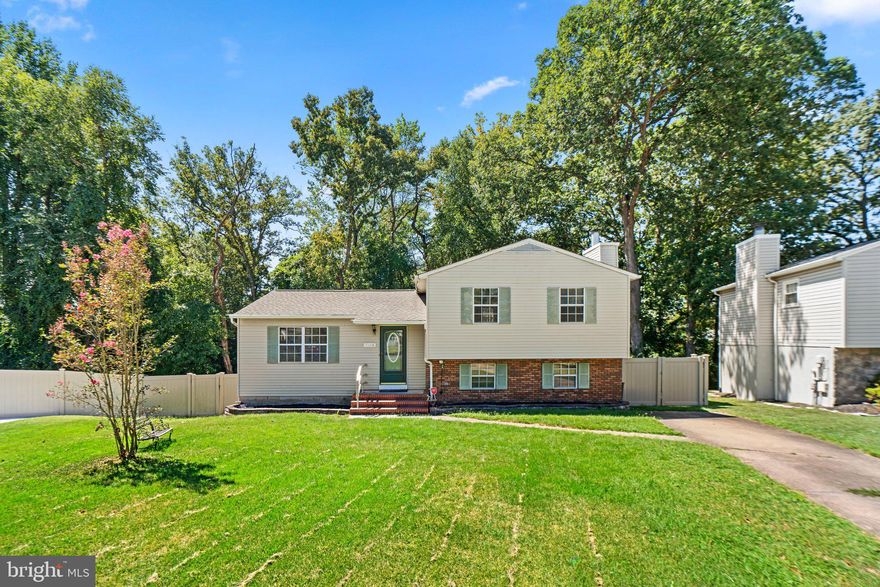 Welcome to 7108 Renwick Court. This charming 3 bedroom, 2-and-a-half-bathroom multilevel split-level single-family home located in Glen Burnie, is ready for you to call home. This home offers a perfect blend of modern amenities and classic charm, making it an ideal place to call home. As you step inside, you are greeted by a spacious and inviting living area, perfect for entertaining guests and relaxing. The open floor plan seamlessly connects the living room, dining area, and kitchen, creating a warm and inviting atmosphere. The kitchen is a chef's dream, featuring sleek countertops, ample cabinet space, and stainless-steel appliances. Off the kitchen, you will have access to a conditioned four-season style room with a small deck just outside. Upstairs, you will find three generously sized bedrooms, each offering plenty of natural light and closet space with the primary Bedroom hosting a private ensuite. Downstairs you are greeted by a spacious large rec room, complete with a half bath, laundry room, and a charming fireplace perfect for relaxing after hours. The 2nd lower level of this home offers additional living space, perfect for a home office, playroom, or media room, with a walkout basement. Walking out to the fully fenced backyard, that backs up to woods.  Close to all major commuter routes (97, 695, 95, 100), Fort Meade, and NSA.