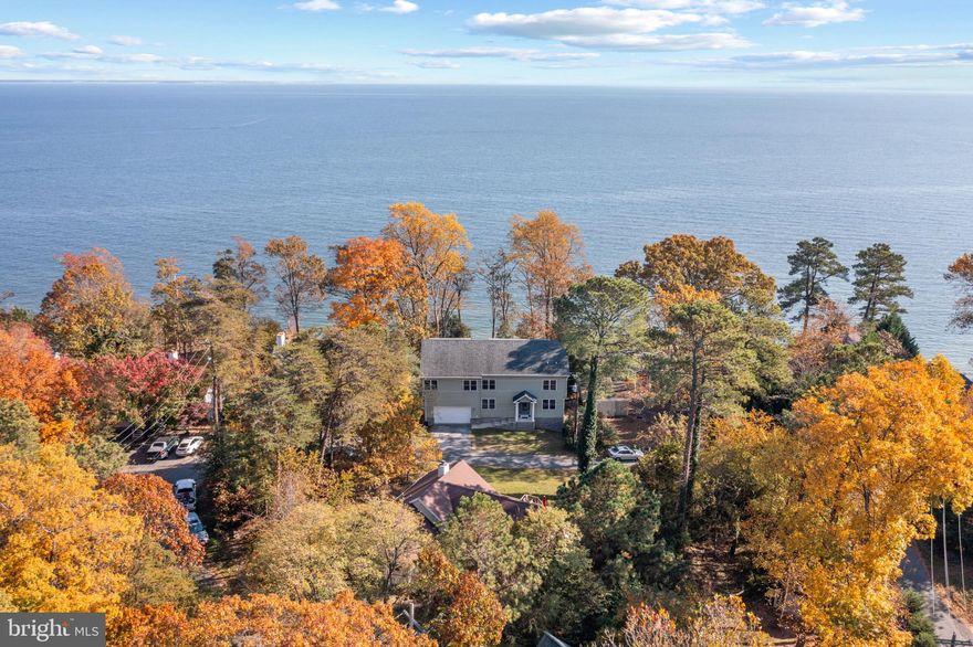 New Year ....New Price...AMAZING VIEWS!!! 4 level Custom 5 BED + 3.5 BA Home with Amazing BAY VIEWS from multiple levels.  Huge Deck with sweeping view of the bay, upper level views from Owners Suite and top level guest suite with views of the ocean as far as the eye can see....  Enjoy sitting on the deck and watching bald eagles fly in to the adjacent trees as you sip your morning coffee.  KITCHEN:  Granite Countertops and Tile Backsplash, Custom Cabinets, Center Island, Bosch Dishwasher, Viking Fridge & Double Wall Ovens, Electric Cooktop, Oversized Deep Sink and window overlooking the Bay with a clear view. Hardwood Flooring on the main level with Gas FP and wall of windows leading to Huge Deck.  -- Massive Owners Bathroom suite with soaking tub, oversized rain shower, massive walk in closets, updates at every turn. 2 - Zone HVAC plus mini splits  - Wonderful designed house with 2 bay garage great for tinkering in your workshop.
Enjoy all the Western shore has to offer! Chesapeake Ranch Estates is a wonderful community with beaches, boat launch, lake, community garden, Close to Solomon's Island, Calvert Cliffs! Purchase for the Privacy or Turn into an amazing Air BnB profit center.