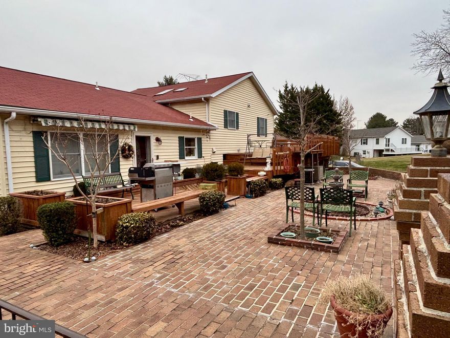 This charming split-level home, built in 1984, offers a perfect blend of comfort and functionality, nestled on a generous 1.12-acre lot. The exterior features a classic brick front, creating an inviting curb appeal that welcomes you home. Step inside to discover a thoughtfully designed interior that boasts three spacious bedrooms and three full bathrooms, along with an additional half-bath on main level for convenience. The traditional floor plan seamlessly connects the eat-in kitchen and the combination dining/living area, making it an ideal space for gatherings and everyday living. Natural light pours in through skylights, enhancing the warm ambiance throughout the home. The kitchen is equipped with modern appliances, including a built-in microwave, dishwasher, refrigerator, and stove ensuring that meal preparation is a breeze. The fully finished basement offers additional living space, complete with cozy gas fireplace, garage access and ample storage/mudroom area. Whether you envision a playroom, home office, or entertainment area, this versatile space can adapt to your needs. Outside, the property features an oversized attached garage with room for two vehicles and additional storage, along with off-street parking for over six more. The asphalt driveway adds to the convenience of this well-maintained home. Located in a vibrant community, this home is surrounded by excellent local amenities. Residents enjoy easy access to Main Street and nearby parks, perfect for outdoor activities and leisurely strolls. Westminster is known for its friendly atmosphere and community events. Public services are readily available, enhancing the overall convenience of living in this area. This property is not just a house; it's a place to create lasting memories. With its inviting features and community-oriented location, it's ready to welcome you home.