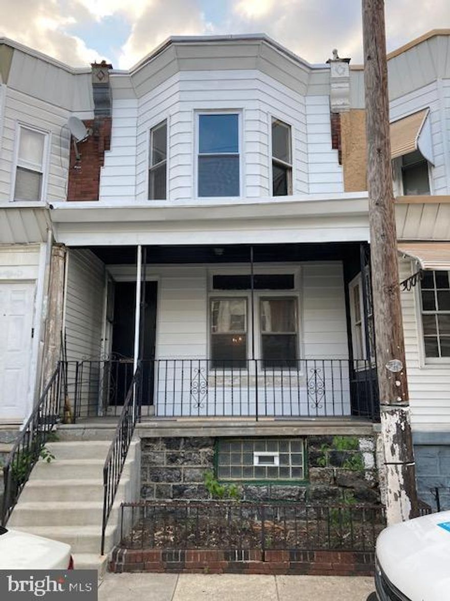 Beautiful 3 bedroom home on a nice quiet side street right off of Market in West Philadelphia. This home is a minute walk to the 60th & Market train station, so you can be in center city in a few minutes!  The home has a large covered front porch with a gate. Enter to find a large living room with gorgeous hardwood floors, stained glass window, and beautiful columns which lead to a formal dining room. Continue into the brand new kitchen which features granite countertops, tons of cabinet storage and stainless steel appliances- including a dishwasher. At the back of the house find a bonus room with some additional kitchen cabinet storage. To the left there is also a powder room with a window that looks out to your backyard which has a small patio area, fencing, and landscaping. The basement is huge, clean and dry and has a washer and dryer for your convenience, as well as ample room for storage. Upstairs, there are 3 large bedrooms with hardwood flooring, each of them with their own closets. The upstairs bathroom is modernized and has a linen closet for additional storage.  This beauty will be available as of July 17th so let us know if you're interested!