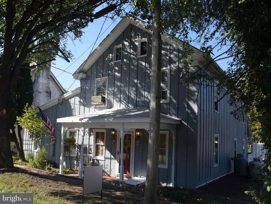 Step back in time with this charming Colonial-style home, located in the heart of Gerrardstown’s historic district. Built in 1800, this one-of-a-kind property blends timeless character with modern updates. This property is registered within the Gerrardstown Historic District. It once housed the old Post Office.
Inside, you’ll find wide plank wood floors (recently refinished), exposed beam ceilings, and partial log interior that highlight the home’s unique charm. The updated kitchen features new stainless steel appliances and flooring.
The spacious main-level addition offers a versatile flex space with a private entry, half bathroom, and an extra room perfect for an office, studio, or storage—ideal for a home business or creative space.
Upstairs, you’ll find 3 bedrooms and a newly renovated full bathroom (2024). A walk-up attic provides endless possibilities for additional living space or storage.
Much of the exterior has been freshly painted, including the covered front porch, back porch and fence. The private driveway leads to a garage/barn with loft storage or workspace,. There is also alley access in the back for convenient parking.  Recent updates include a 200-amp electric service.
Easy access to commuter routes and close to local schools. Don't miss out on this rare historic gem with endless potential!