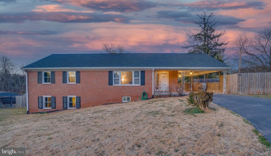 Catlett, Virginia property  is move in ready!   Conveniently located to Warrenton, shopping & restaurants and major roadways (Route 29 and Route 28) This home says, "Welcome" as you enter the front foyer/living room area with hardwood flooring and freshly painted interior throughout.   Sliding Pocket door separates the Living Room from the Dining Room/Kitchen Area.   Interior features newer appliances, spacious kitchen/dining room combination and gas fireplace.   New refrigerator, pantry and plenty of cabinets for storage.  (Extra Refrigerator conveys in the basement).  Three bedrooms-two baths are on the main level - all with hardwood flooring.  The lower level  has been freshly painted and looks ever so welcoming.  Wood burning fireplace for those cozy days,  lower level bathroom and tile flooring  make for convenient entertaining or family room area.   New doors have been installed in the kitchen entry and front door.  The lower level door has a pet door exit to the back of the lot.  (New Front window is on order for replacement which will complete all updated and new windows. ) New  Roof installation(2016 has a 50 year warranty and is transferable)  with James Hardie vinyl siding and chimney cap.    New  Provia vinyl windows with a lifetime warranty.  New front window is on order and will be installed in March, 2021.   Septic system pumped in 2018.  Spacious utility room is a dream and ideal area for more storage or adding an additional room.   Laundry area, tankless hot water heater and plenty of space to convert into office area or another room has potential!   Outside yard is fully fenced in the back and has a covered dog pen and concrete sidewalk.    Storage shed in the back is  sold "as is."  Off the carport is another sectioned fenced area  for many uses!  In the front is a buried line which has invisible fencing.  This property has so many options!  Let's talk about how to make it yours!