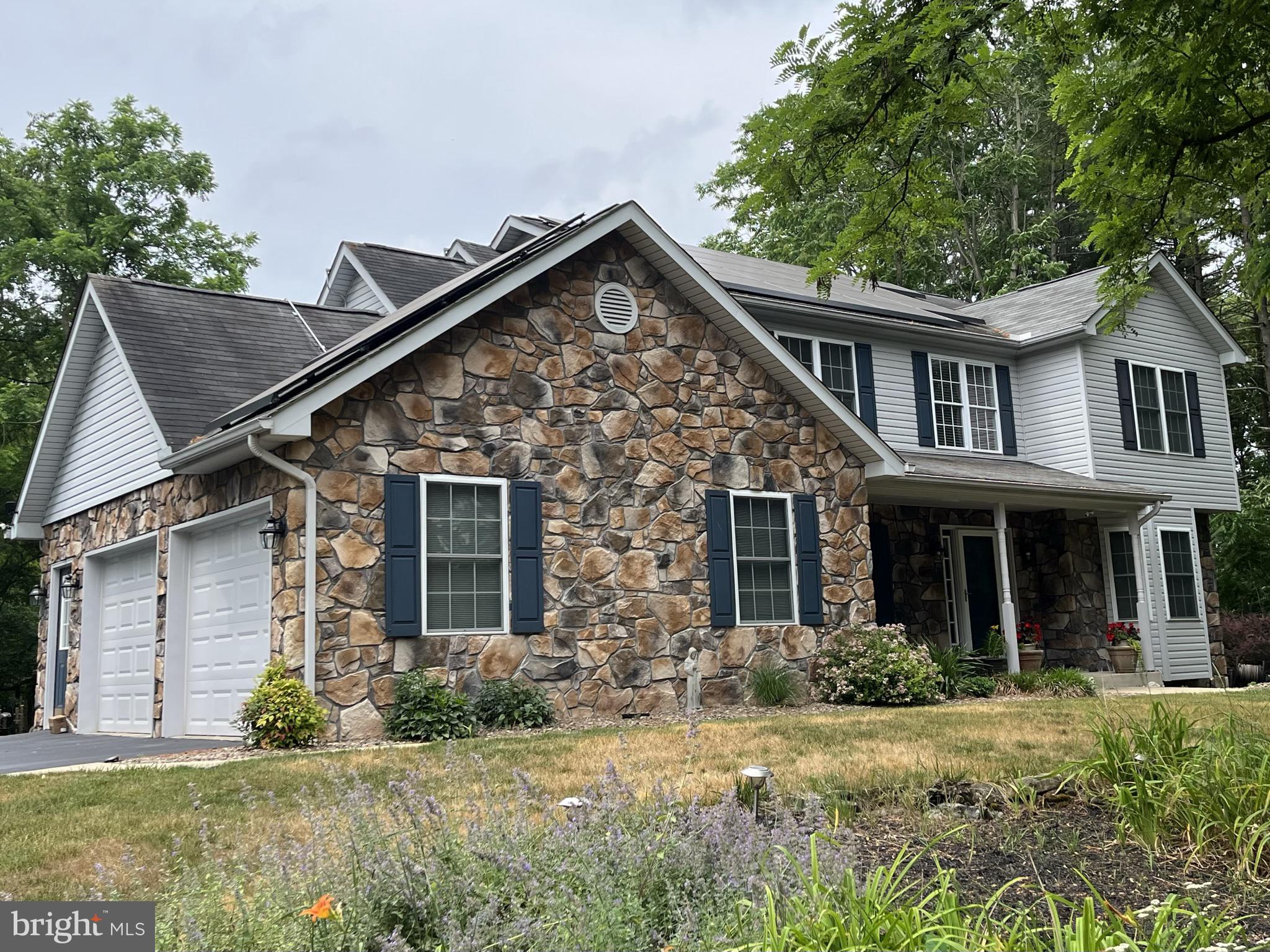 Welcome to this immaculate 4 bedroom, 3.5 bathroom home nestled on nearly 3 acres of park-like serenity. The well-designed floor plan offers a seamless flow throughout. Step out from the kitchen onto the inviting Trex deck, perfect for enjoying the outdoors. In addition, you'll find a spacious 10x16 stone patio and a 12x20 concrete patio, providing ample space for outdoor entertaining. The primary suite is a true retreat, featuring a large walk-in closet with a 6x4 dressing room. Start your day in the breakfast room, where you can take in the picturesque view of your lush backyard. The wet bar conveniently connects the kitchen and dining room, enhancing your entertainment options. Pocket doors off the foyer lead to the elegant living room, adding a touch of sophistication. Convenient first-floor laundry room. Hardwood floors, adding warmth and charm. The lower level offers a spacious recreation room with a full bath, providing a versatile space for relaxation or hosting guests. Storage will never be an issue with an abundance of space available. The house is equipped with an active radon system and boasts skylights in both the foyer and primary bedroom, allowing natural light to illuminate the space. This home has been lovingly occupied by the original owner and is truly move-in ready. Crafted by renowned builder Jeff Warren, the kitchen cabinets were skillfully built by Hess. Located in the desirable Smithsburg School district, this home offers the perfect combination of tranquility, functionality, and quality craftsmanship. Don't miss the opportunity to make this remarkable property your own. All offers due MONDAY by Five pm