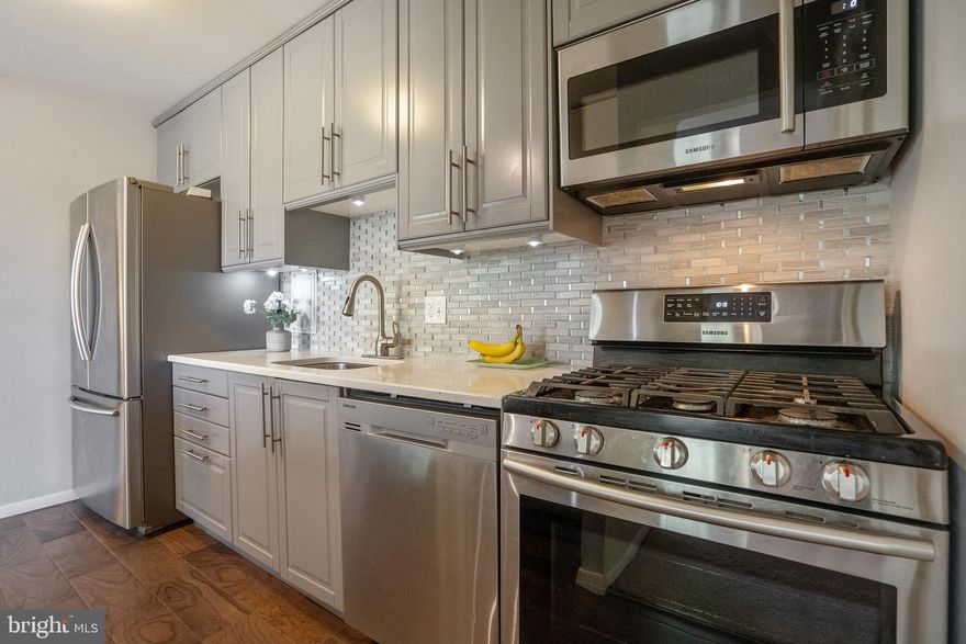 Beautiful Top Floor Open Concept Condo in the heart of North Bethesda. Equipped with updated kitchen, with new cabinets, stainless steel appliances, new backsplash, and Quartz countertops. Crown molding in Living and Dining room. Sliding glass doors from DR to Balcony with Storage closet. Modern updated bathrooms with RARE half bath in Mater bedroom. Bathrooms boasts new tub, fixtures, and vanities. Excellent location - steps from bus. Close to Twinbrook and White Flint Metro. Walking distance to  Rockville Pike, Pike and Rose, and much more. Highly Sought after School District. Condo fee INCLUDES ALL UTILITIES (except cable) and use of community amenities - pool, tennis, tot lots, parking for up to 3 cars. Extremely pet friendly community. Complex backs to Rock Creek Park.